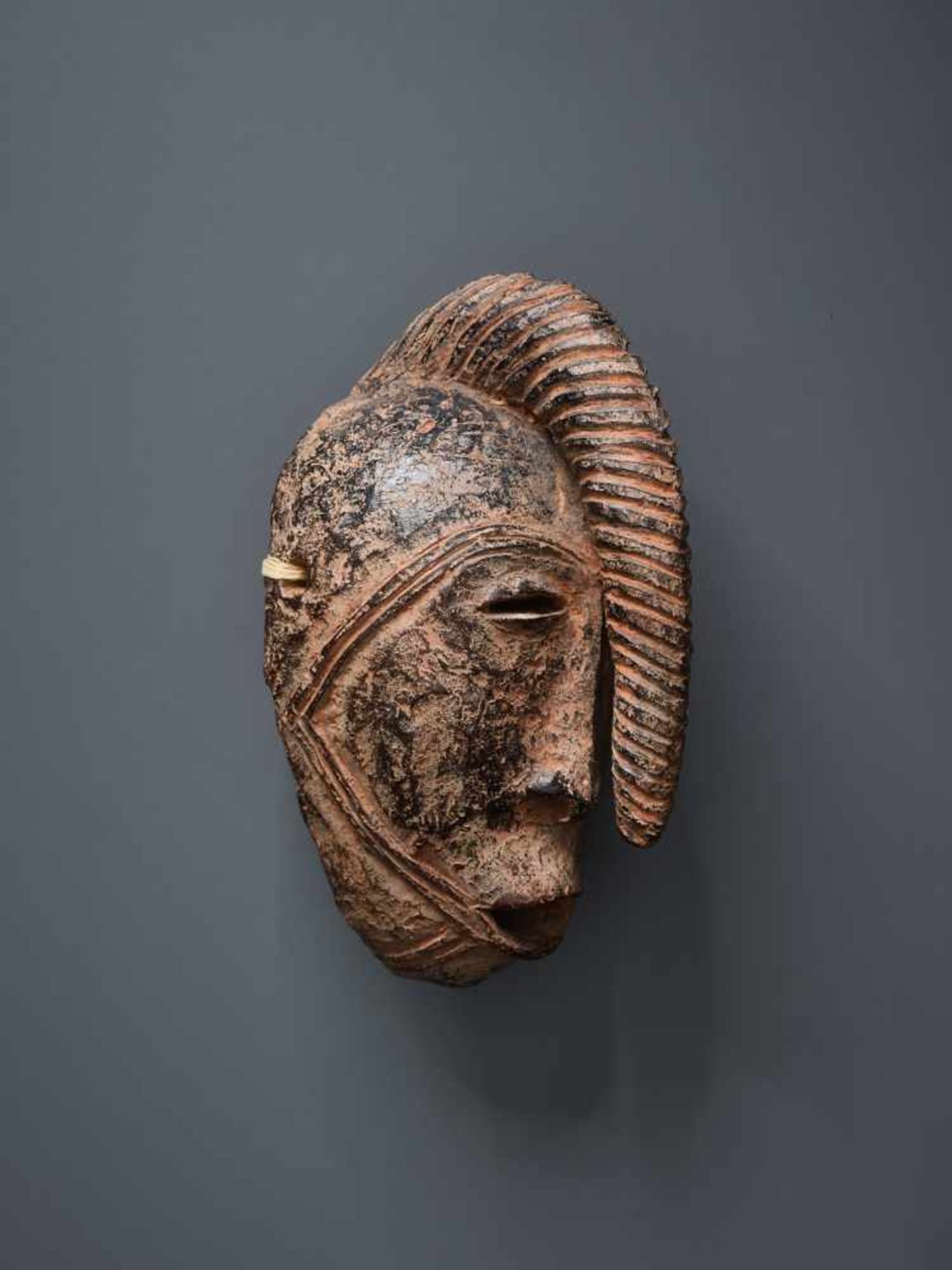 AFRICAN TRIBAL ART, A PASSPORT MASK OF A WARRIORTerracotta with black glaze in some - Image 2 of 4