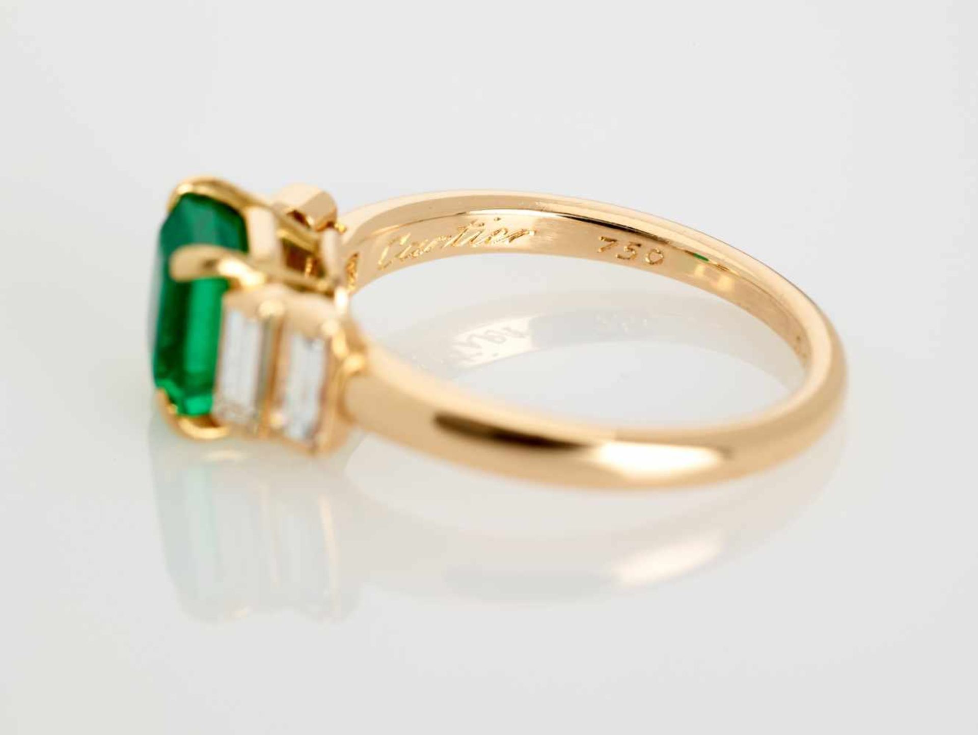 AN IMPORTANT CARTIER EMERALD AND DIAMOND RING Franceca. 1990, signed ‘Cartier’, assay ‘750’, numbers - Image 7 of 9