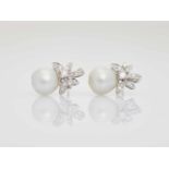 A PAIR OF WHITE GOLD, DIAMOND AND SOUTH-SEA PEARL EARRINGSPossibly Frenchafter 1930, each marked ‘