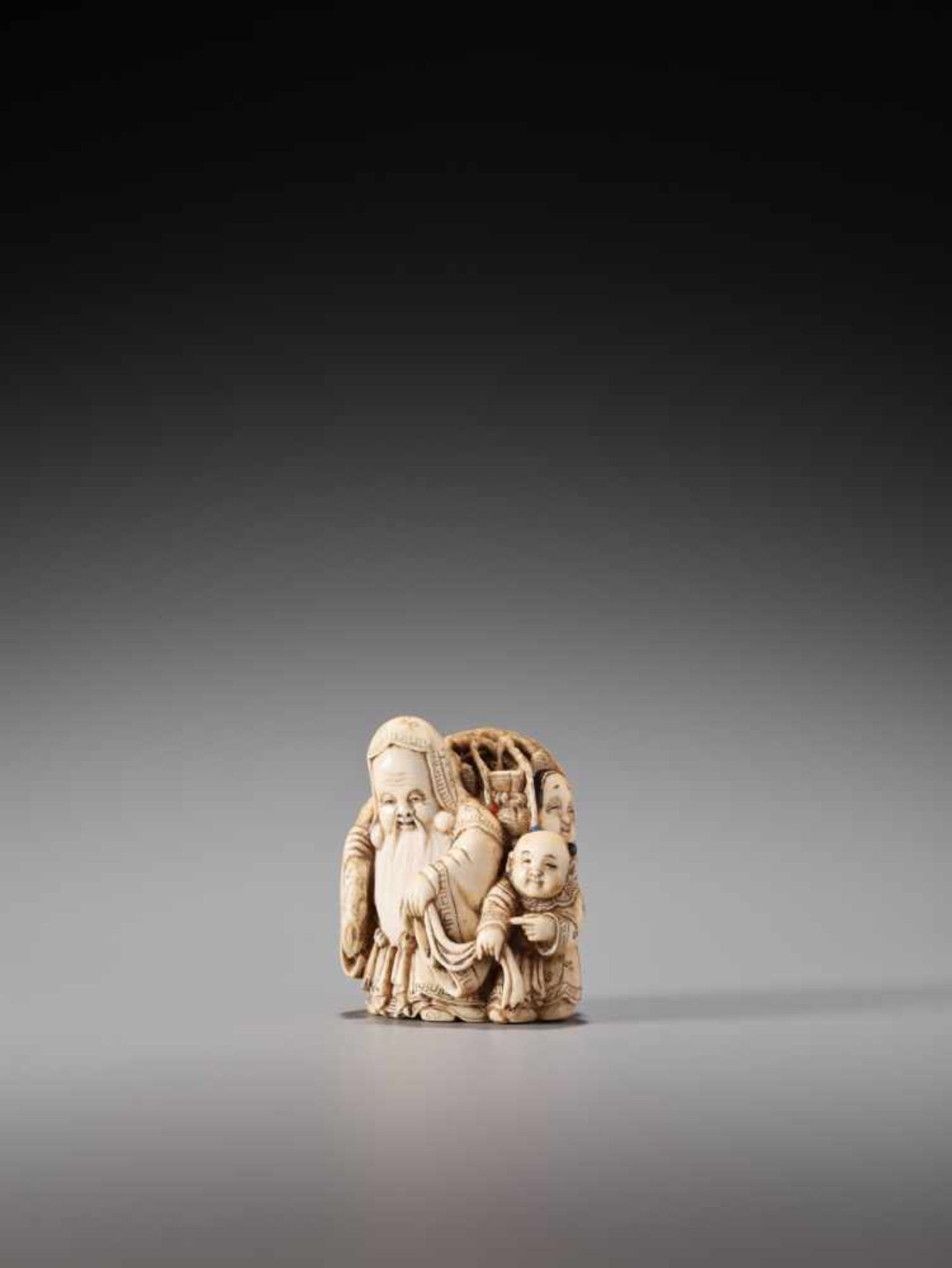 A FINE IVORY NETSUKE OF FUKUROKUJU WITH THE BRANCH OF THE TORI-NO-ICHI FAIR BY MEIGYOKUSAIIvory - Image 3 of 11