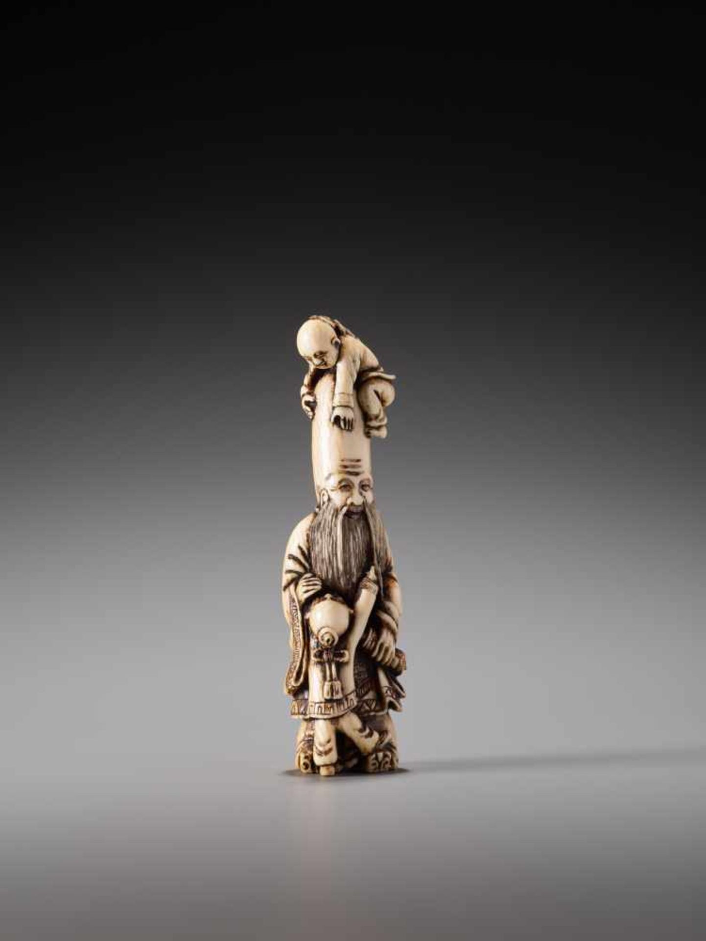 AN IVORY NETSUKE OF FUKUROKUJU AND TWO KARAKO BY SHOZANIvory netsukeJapan19th century, Edo period ( - Image 2 of 8