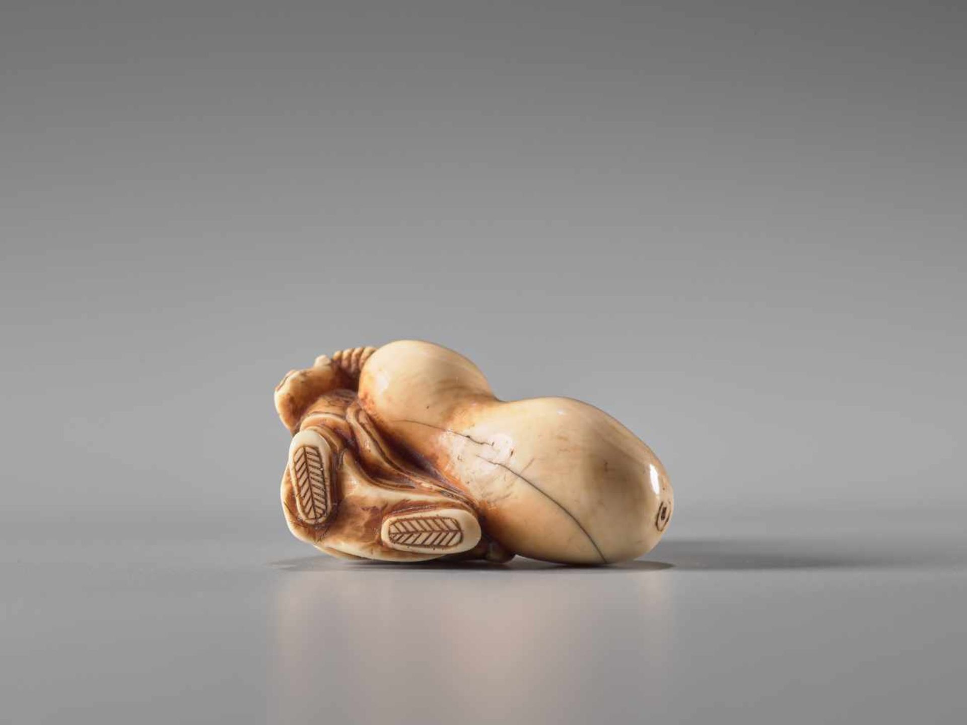 A SMALL IVORY NETSUKE OF CHOKARO SENNIN WITH GIANT HYOTANIvory netsukeJapanlate 19th century, - Image 6 of 6