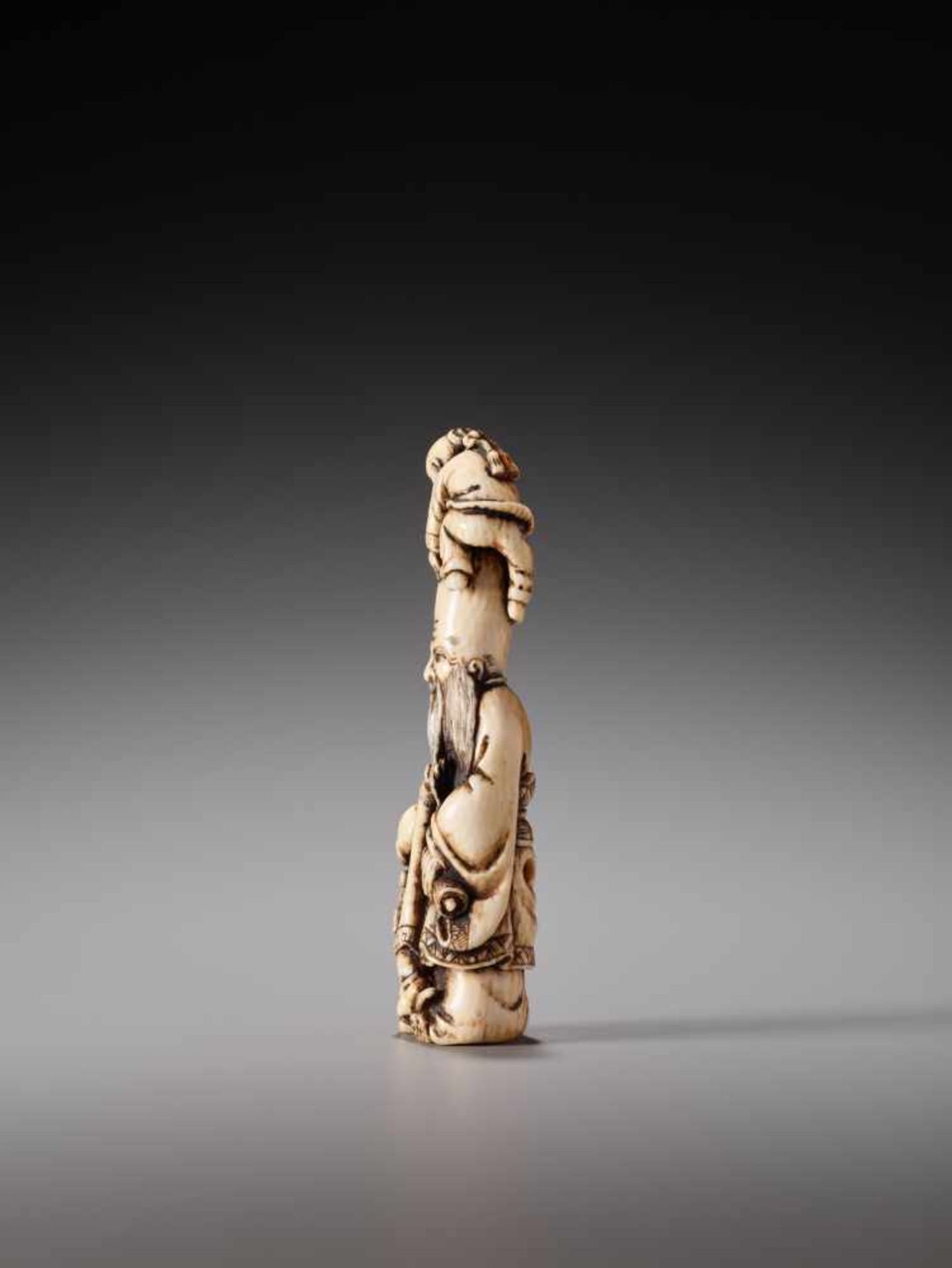 AN IVORY NETSUKE OF FUKUROKUJU AND TWO KARAKO BY SHOZANIvory netsukeJapan19th century, Edo period ( - Image 3 of 8