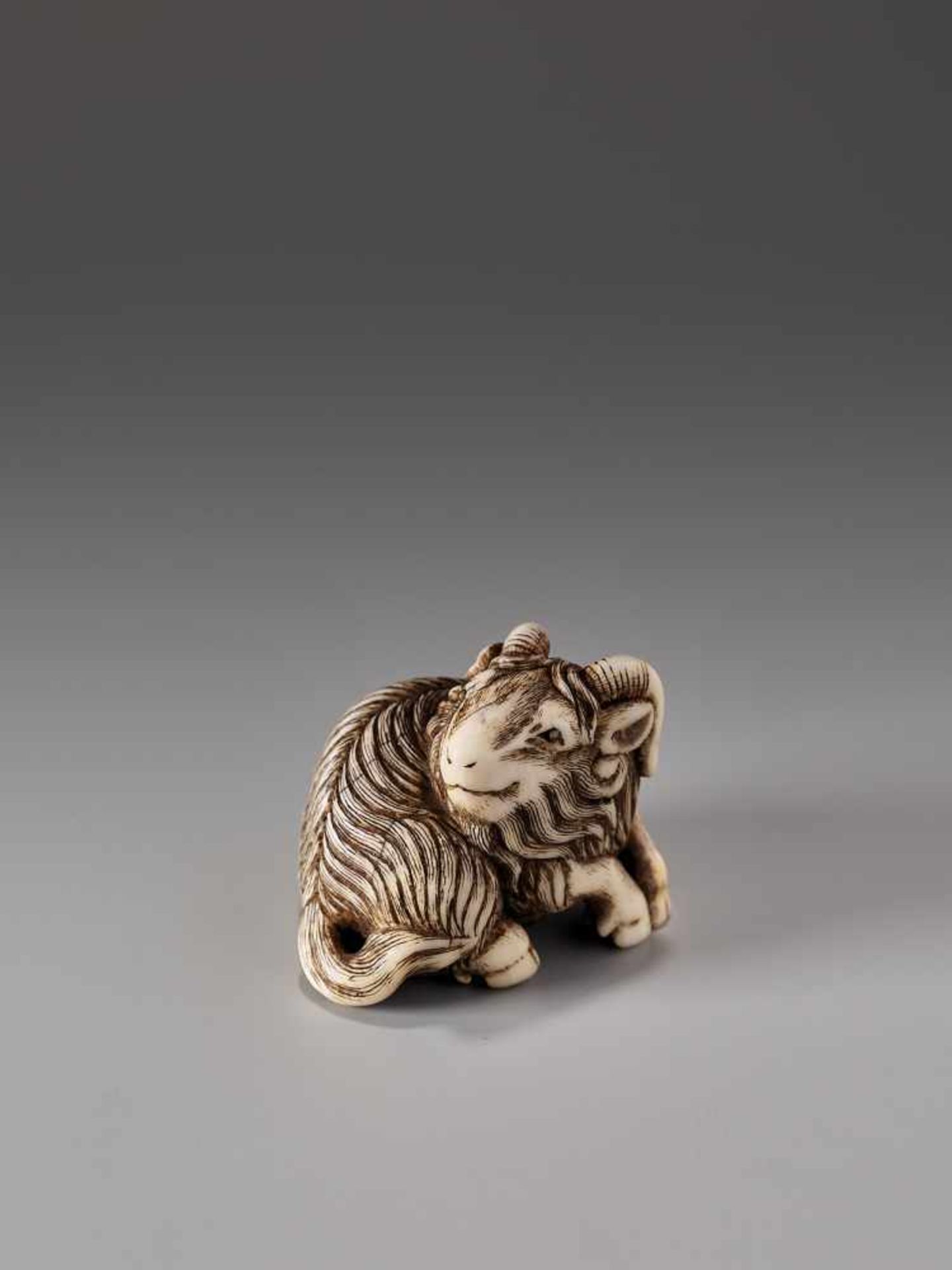 AN IVORY NETSUKE OF A GOATIvory netsukeJapanc. 18th to 1st half of 19th century, Edo period (1615-