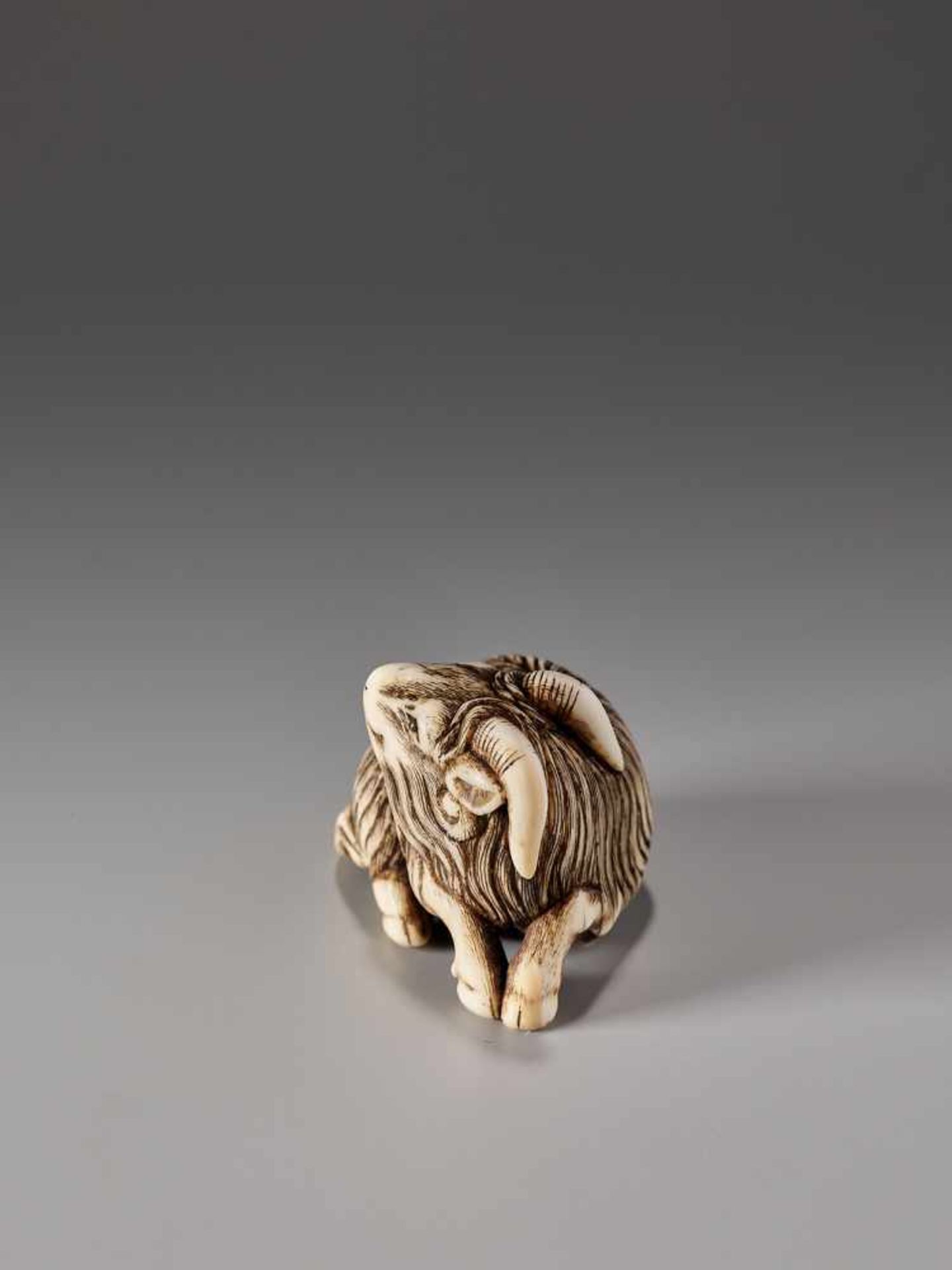 AN IVORY NETSUKE OF A GOATIvory netsukeJapanc. 18th to 1st half of 19th century, Edo period (1615- - Image 4 of 8