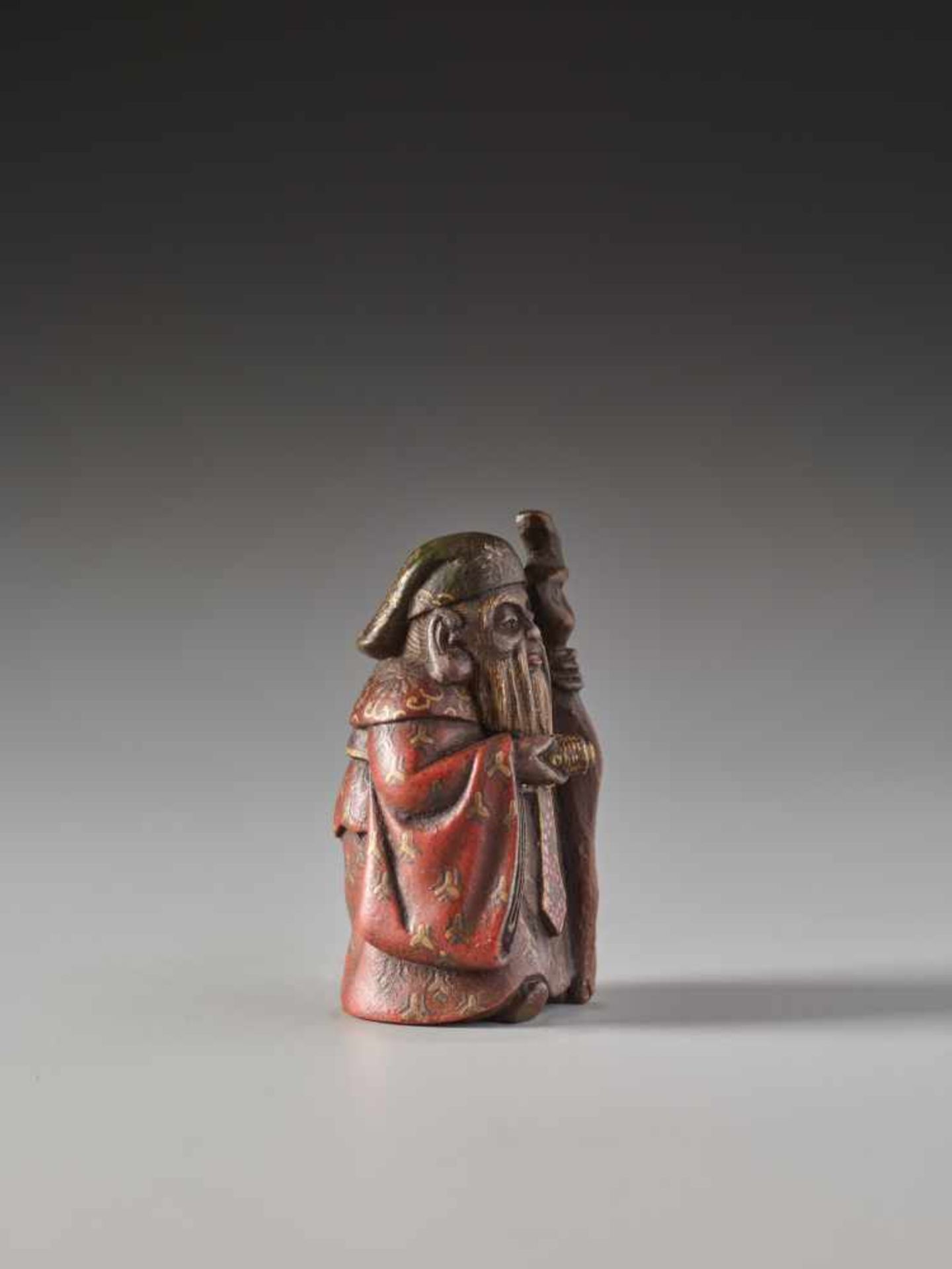 A SMALL LACQUERED WOOD NETSUKE OF JUROJINLacquered wood netsuke with mother-of-pearl inlaysJapanlate - Image 3 of 5