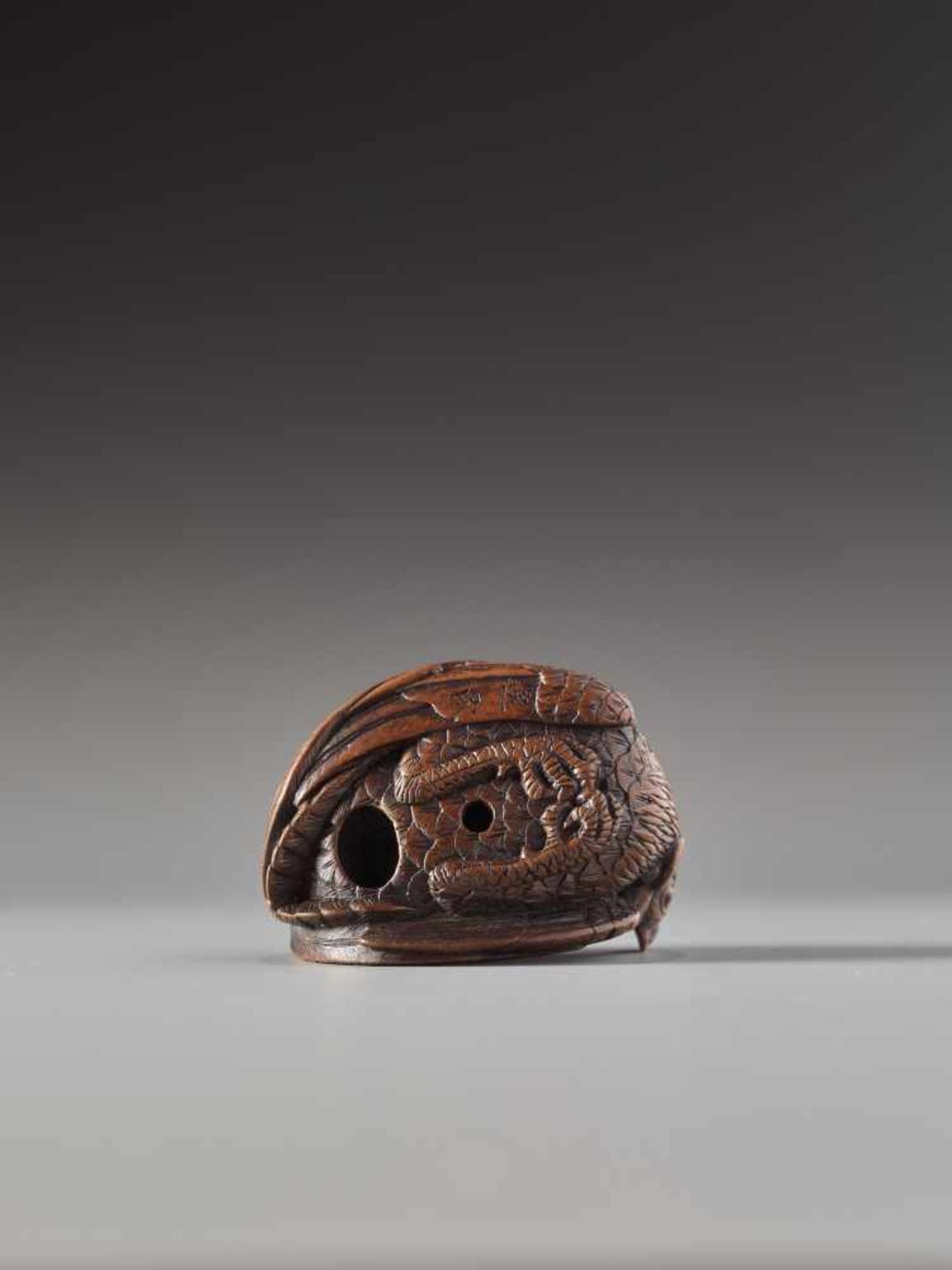 A FINE AND SMALL WOOD NETSUKE OF A RECUMBENT COCKEREL BY HOKYUDO ITSUMINWood netsukeJapan, Edomid- - Image 4 of 10