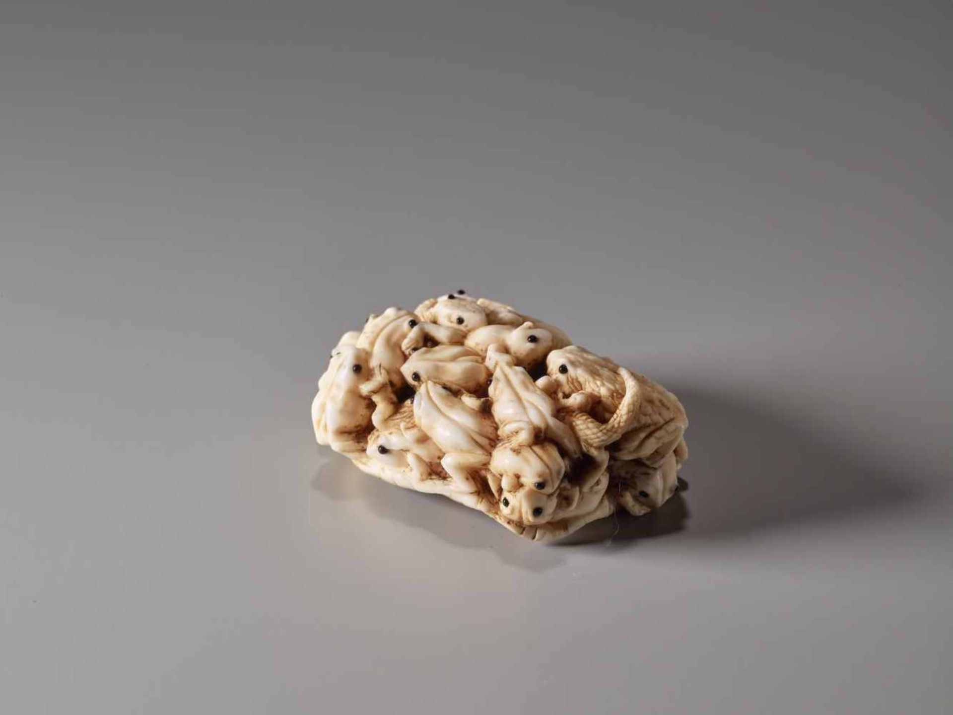 AN IVORY NETSUKE OF MANY TOADS ON A LOTUS LEAF BY MASAMITSUIvory netsukeJapanlate 19th century, - Image 3 of 7