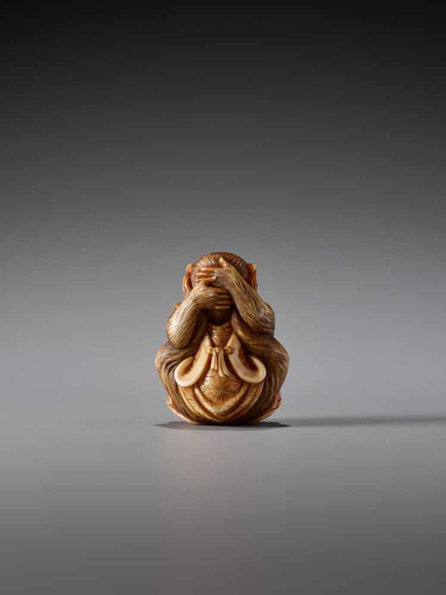 A FINE STAINED IVORY NETSUKE OF THE SANBIKI SARU BY KYOKUSAIIvory netsukeJapanmid-19th century,