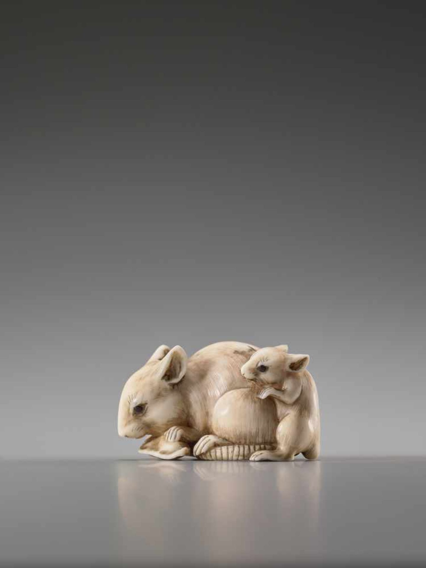 AN IVORY NETSUKE OF TWO RATS BY TOMOKAZUIvory netsukeJapan, Kyoto19th century, Edo period (1615-