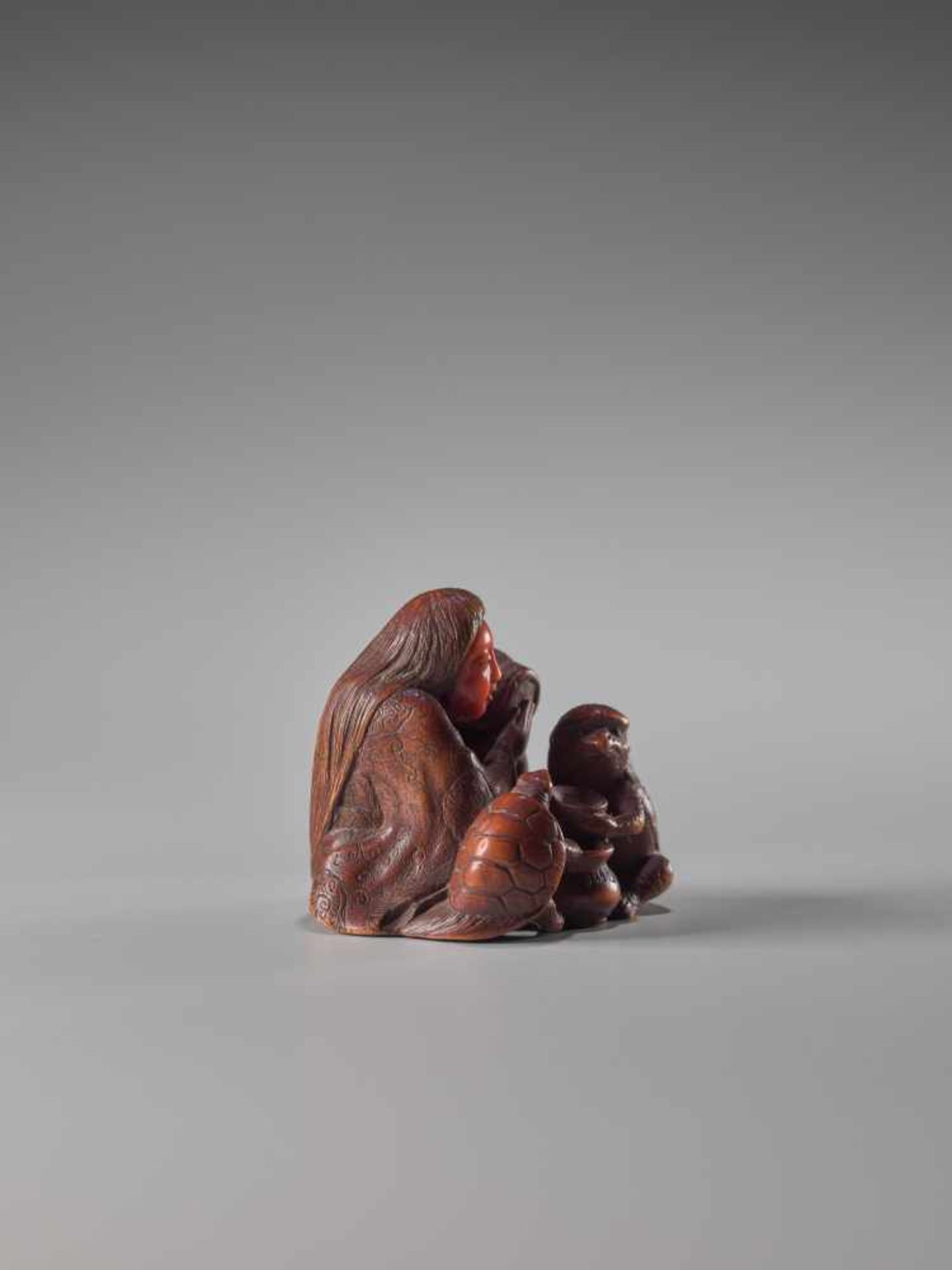 A WOOD AND IVORY NETSUKE OF A DRUNKEN SHOJO WITH MINOGAME AND KAPPAWood and ivory netsukeJapan19th - Image 7 of 8