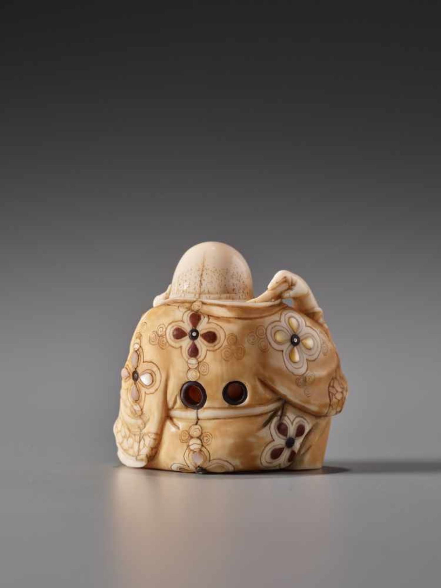 A TOKYO SCHOOL INLAID SPERM WHALE TOOTH NETSUKE OF HOTEI SCRATCHING HIS BACK BY GYOKUZANSperm - Image 2 of 6