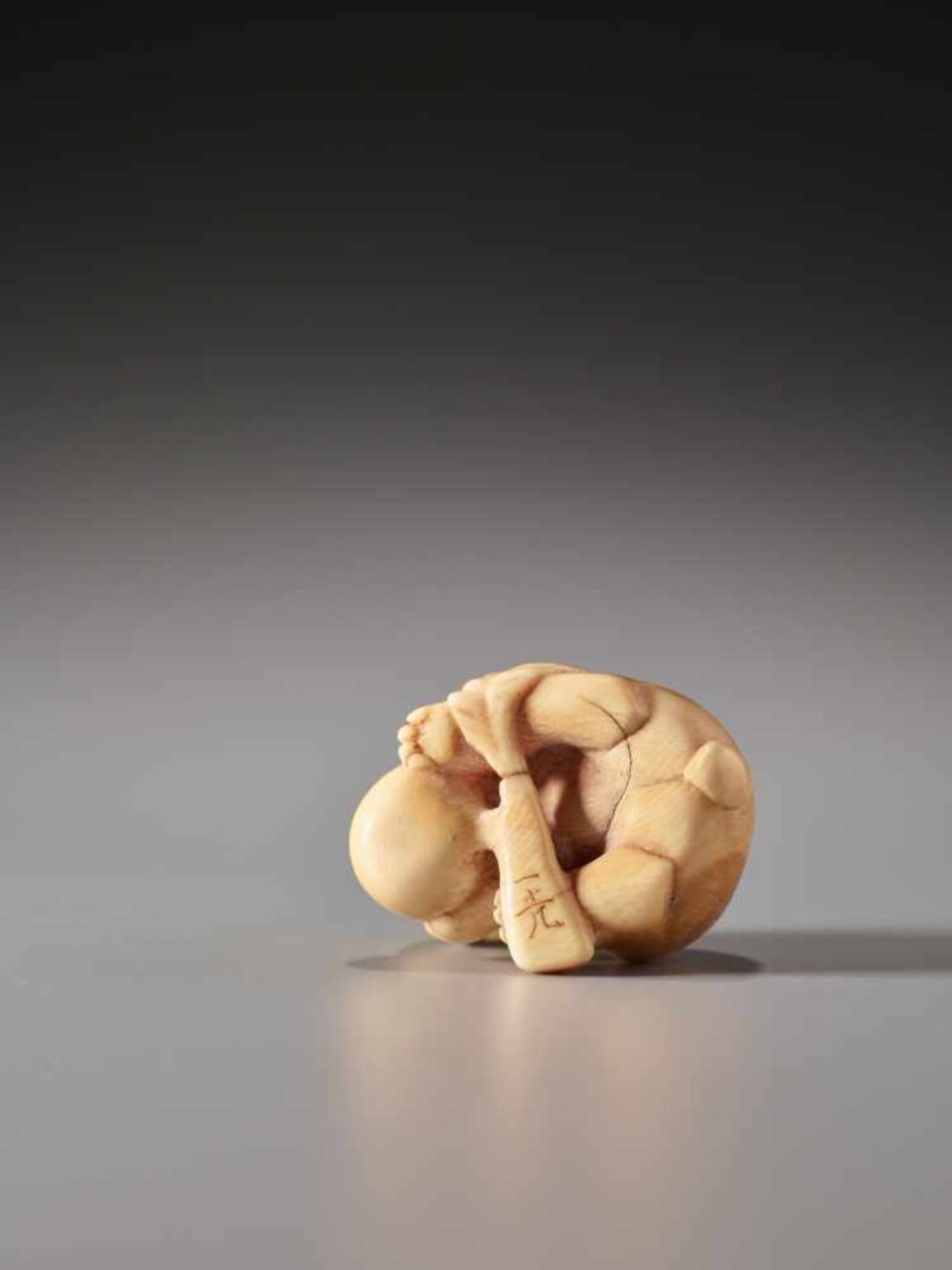 AN IVORY NETSUKE OF A RABBIT WITH LOQUAT BY IKKOIvory netsukeJapan, Nagoya19th century, Edo - Image 7 of 9