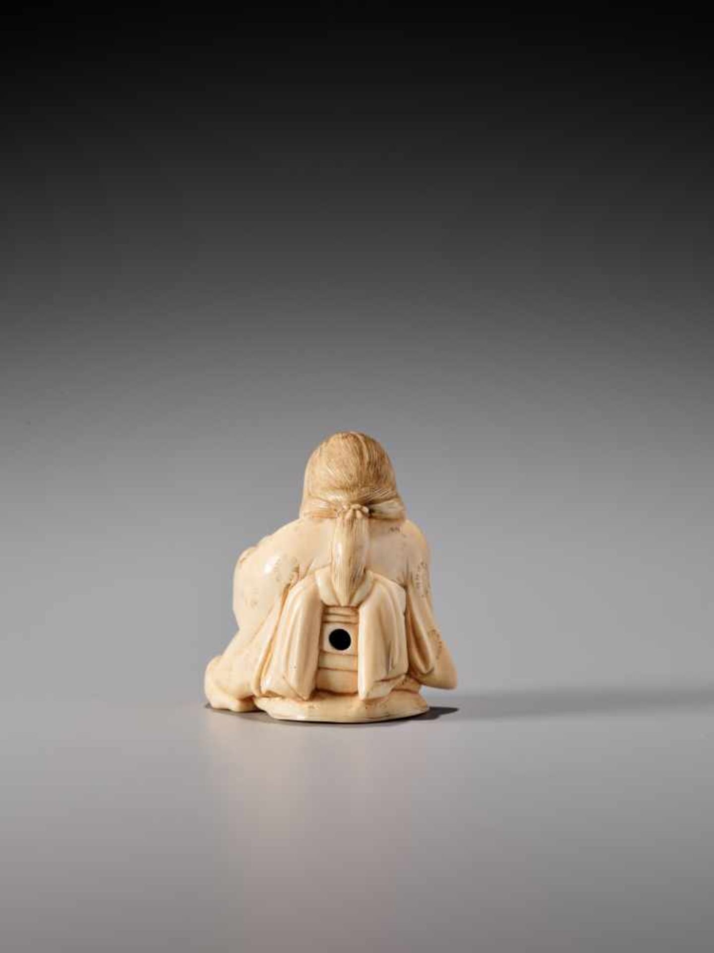 AN IVORY NETSUKE OF OKAME WITH TENGU MASK BY GYOKUZANIvory netsukeJapan, Tokyolate 19th century, - Image 5 of 8