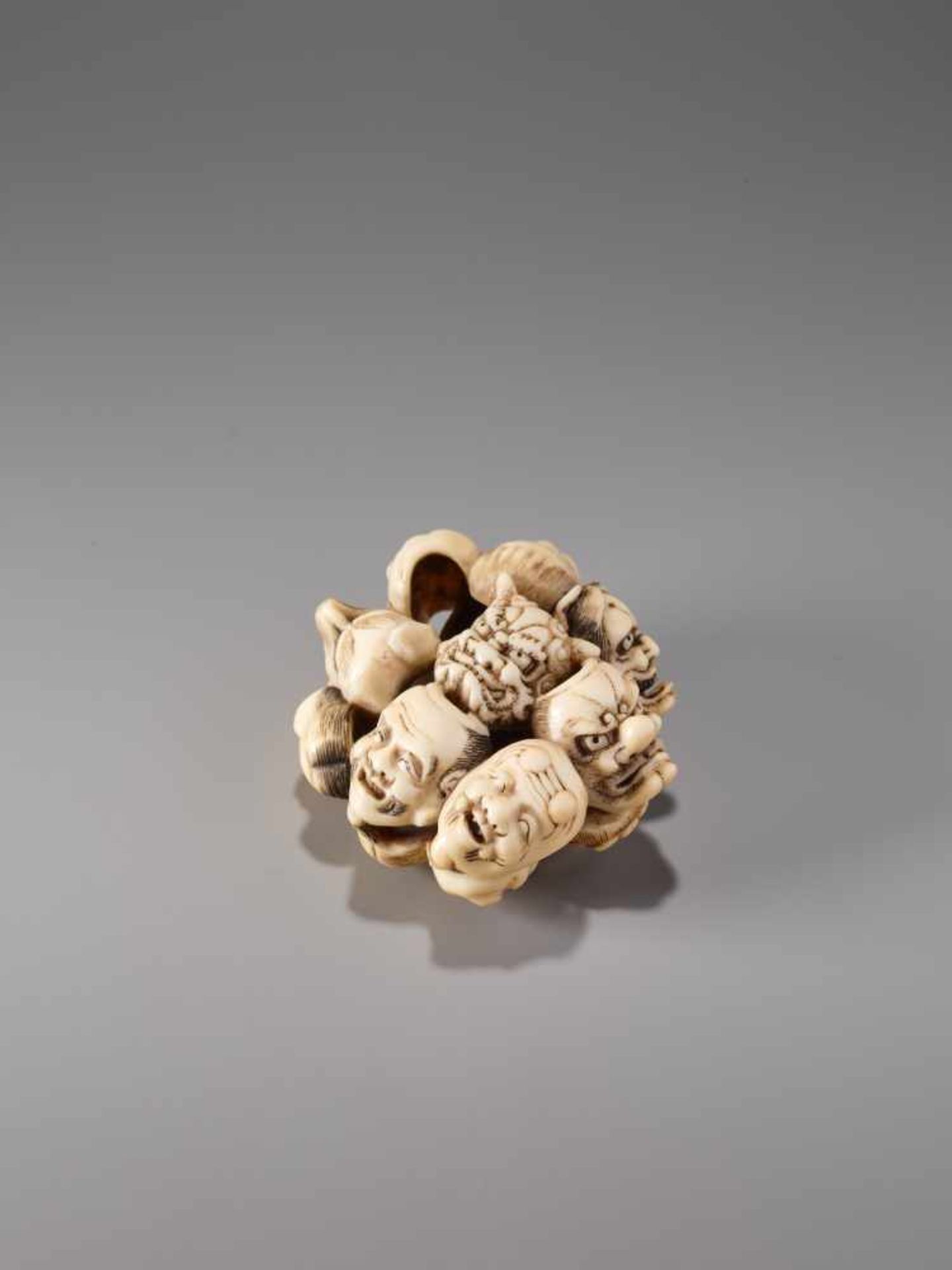 AN IVORY ‘RYUSA-STYLE’ MANJU NETSUKE DEPICTING FIFTEEN NOH MASKS BY ICHIJO HAKUUNSAI IIIvory - Image 2 of 10