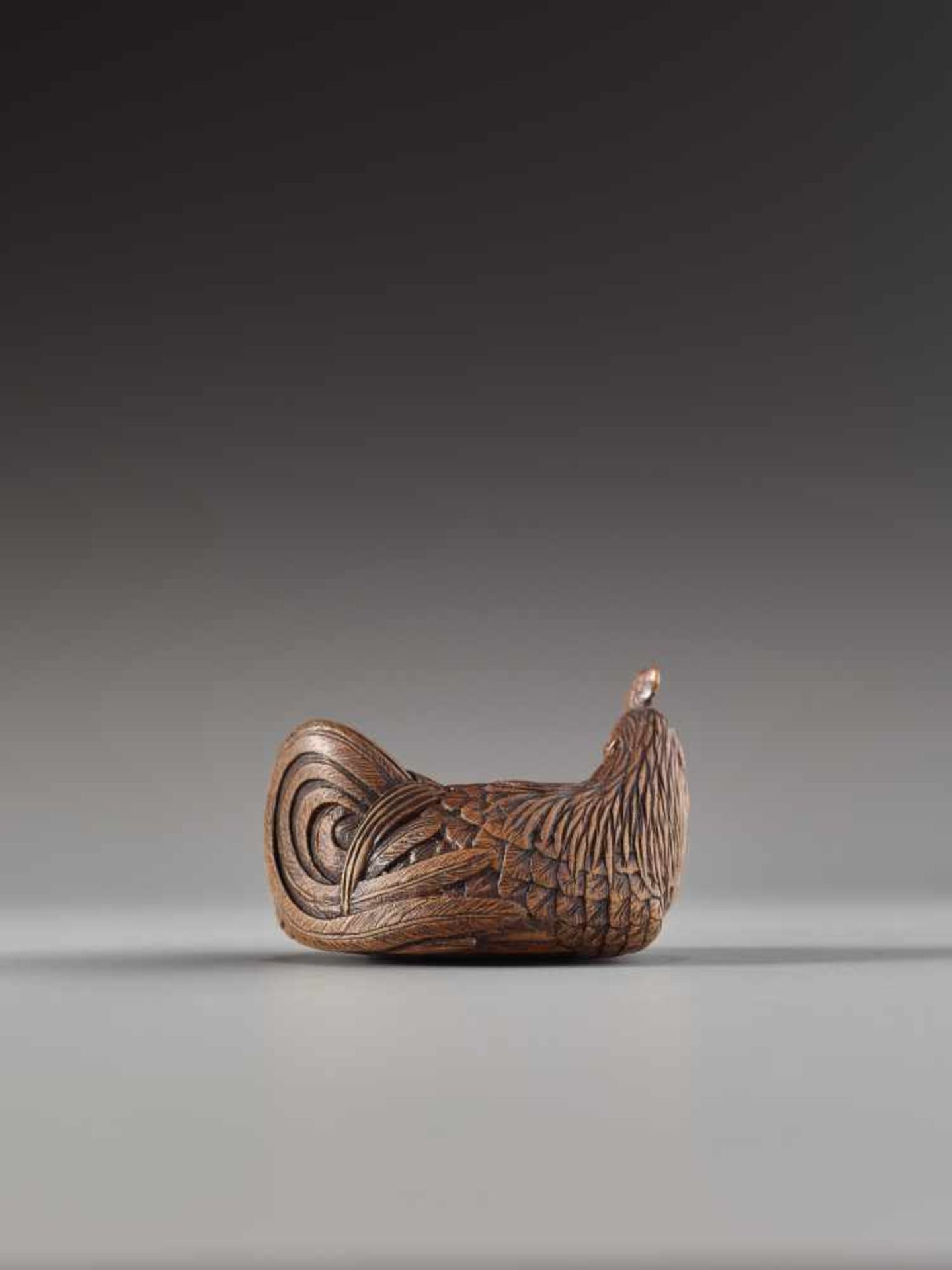 A FINE AND SMALL WOOD NETSUKE OF A RECUMBENT COCKEREL BY HOKYUDO ITSUMINWood netsukeJapan, Edomid- - Image 3 of 10