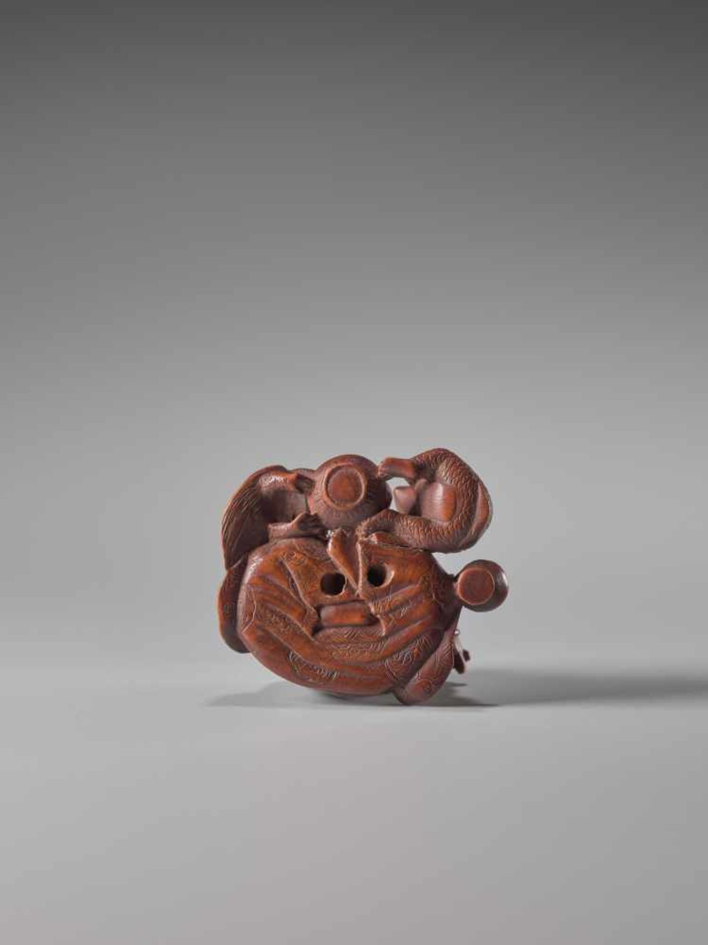 A WOOD AND IVORY NETSUKE OF A DRUNKEN SHOJO WITH MINOGAME AND KAPPAWood and ivory netsukeJapan19th - Image 8 of 8