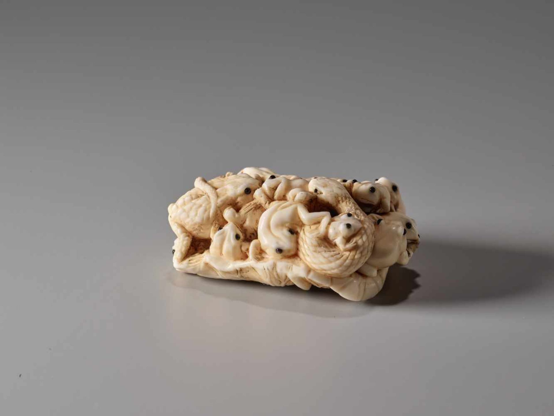 AN IVORY NETSUKE OF MANY TOADS ON A LOTUS LEAF BY MASAMITSUIvory netsukeJapanlate 19th century, - Image 4 of 7