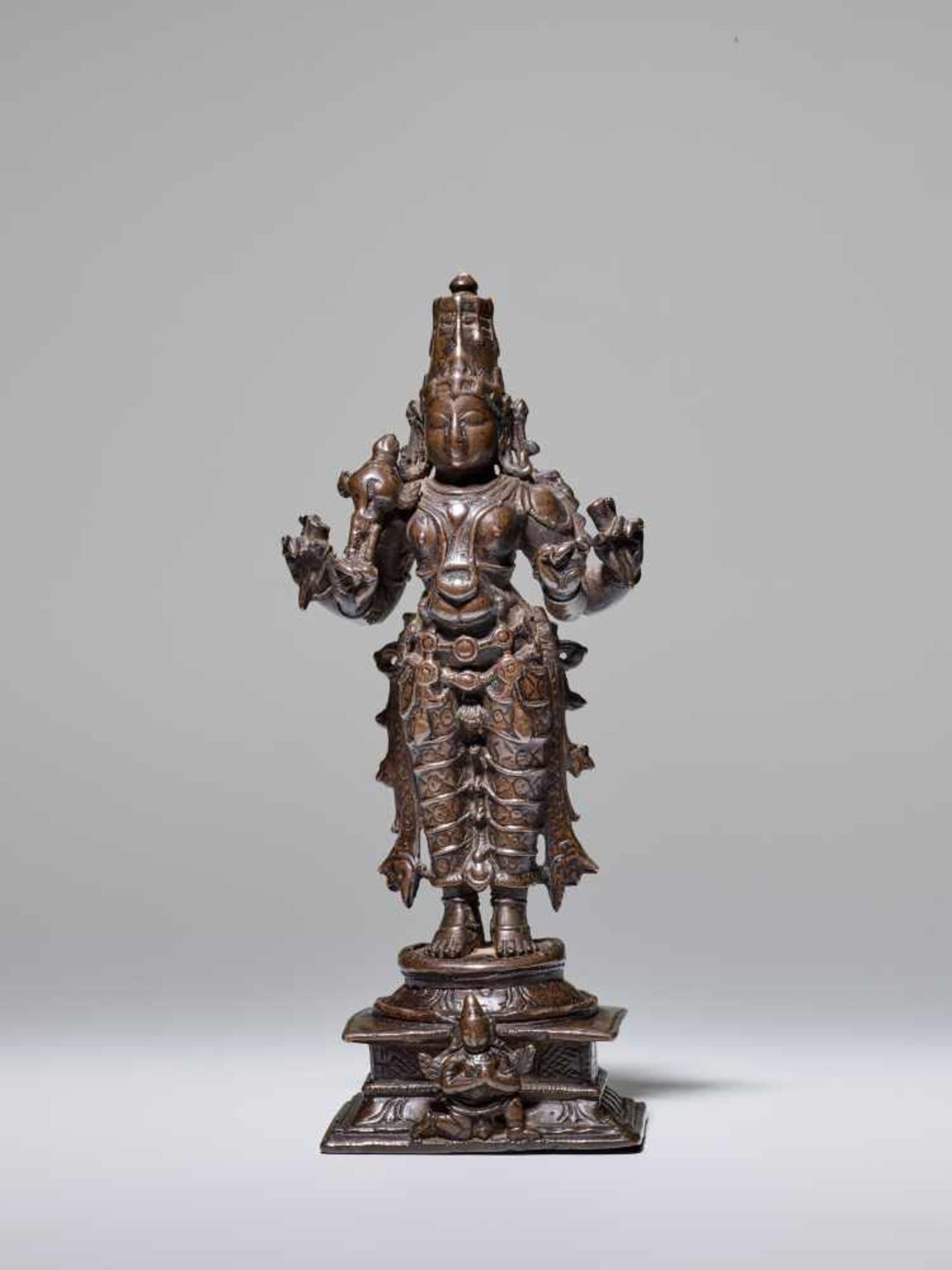 AN INDIAN COPPER BRONZE ALLOY FIGURE OF VISHNU, 18th – 19th CENTURY Cast and chased copper and