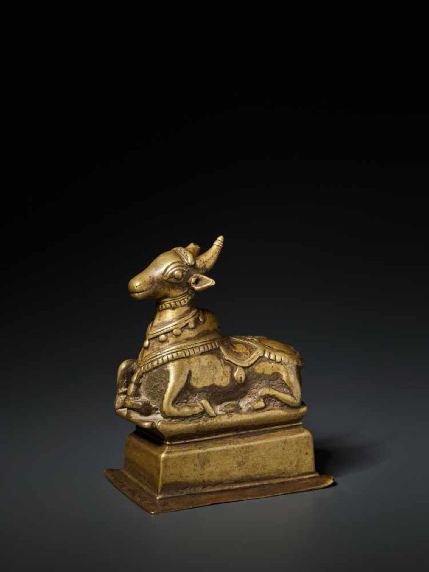 AN INDIAN BRASS FIGURE OF NANDI, 15th CENTURY Brass India, Himachal Pradesh, 15th century Nandi is - Image 2 of 7