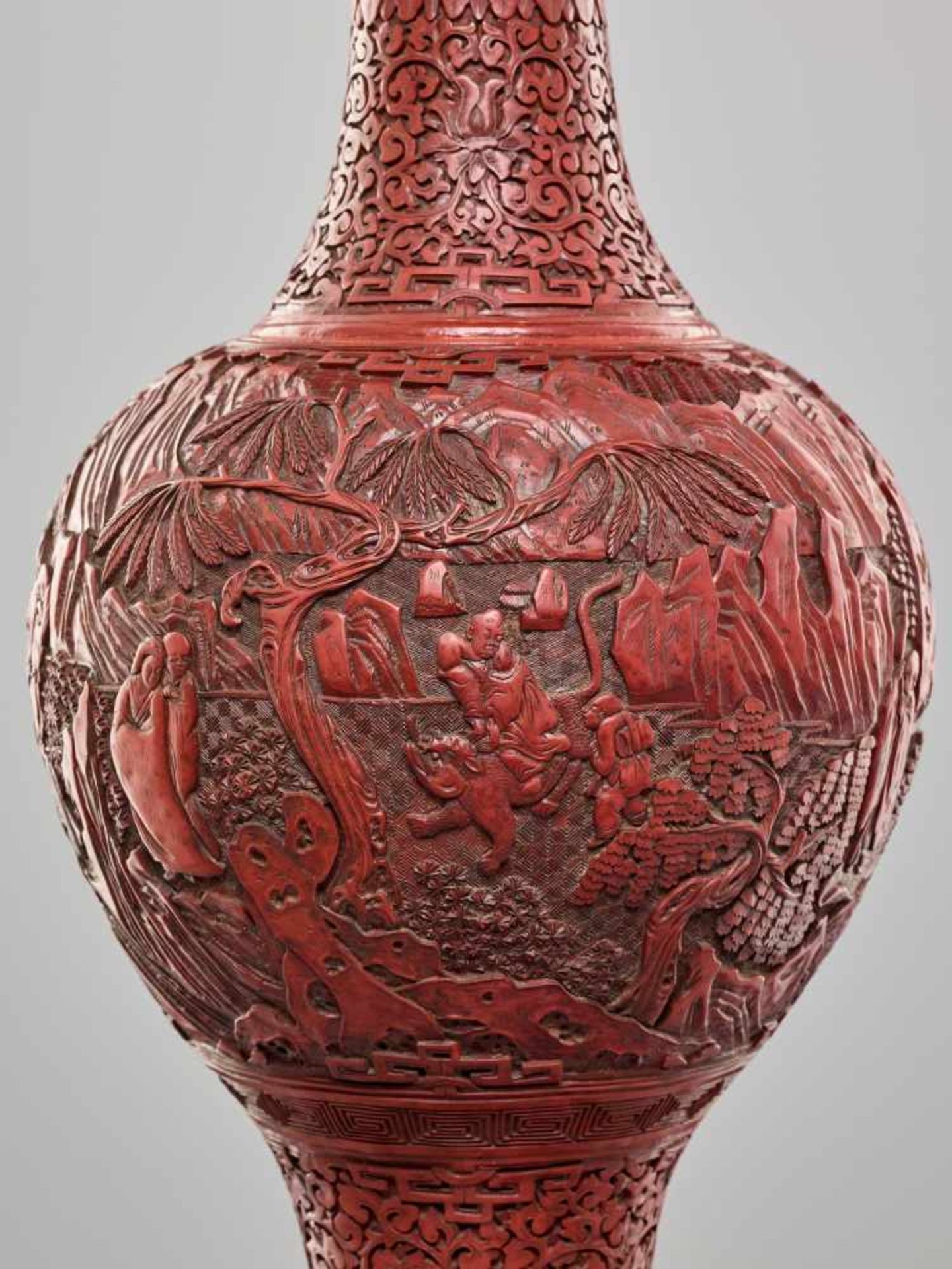 A LARGE PAIR OF CINNABAR LACQUER ‘EIGHT IMMORTALS’ VASES, QING DYNASTYThe body entirely covered with - Image 12 of 26