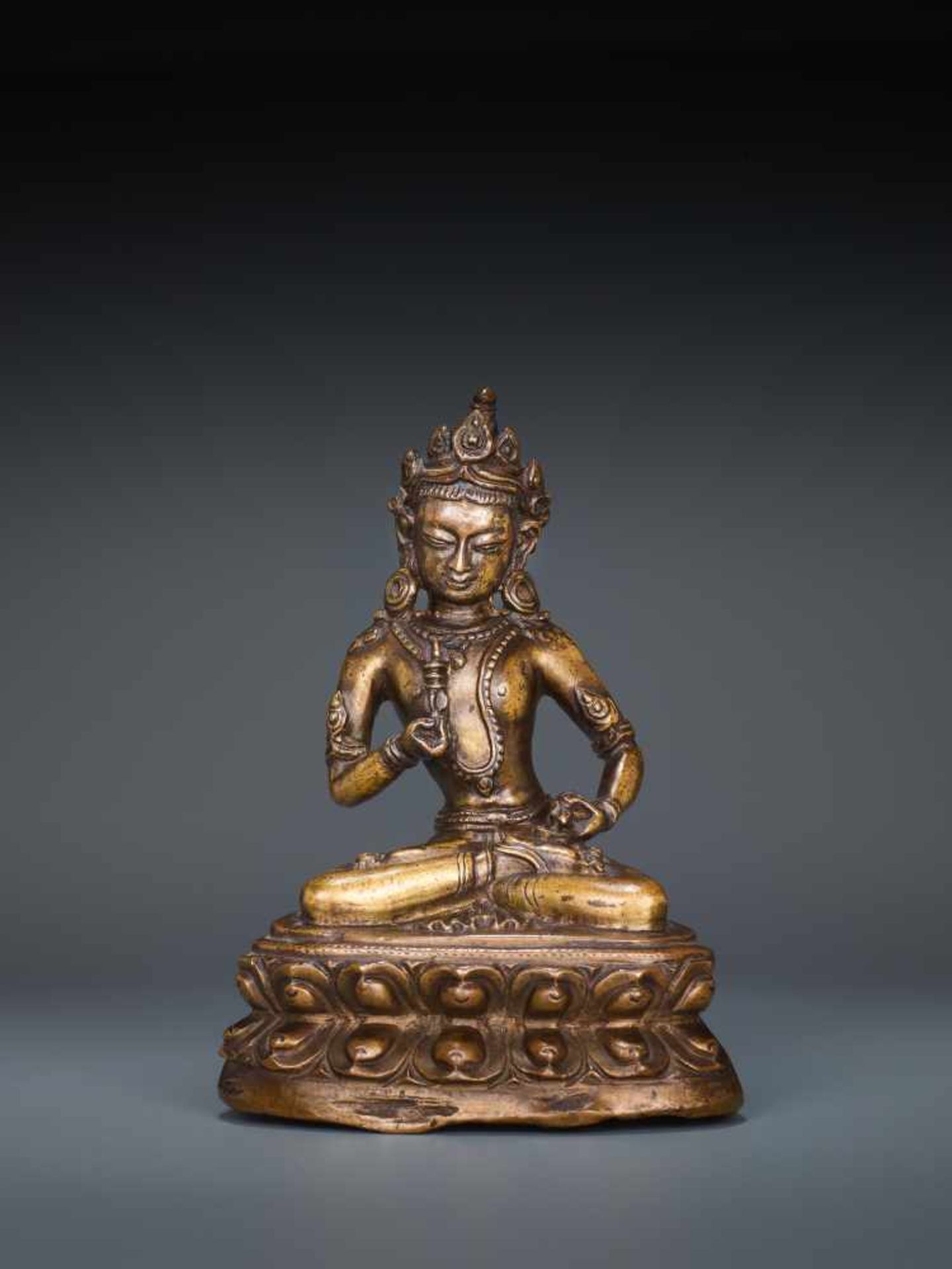 A FINE BRONZE FIGURE OF VAJRASATTVA, TIBET, 16th - 17th CENTURYCast and chased bronze Tibet,