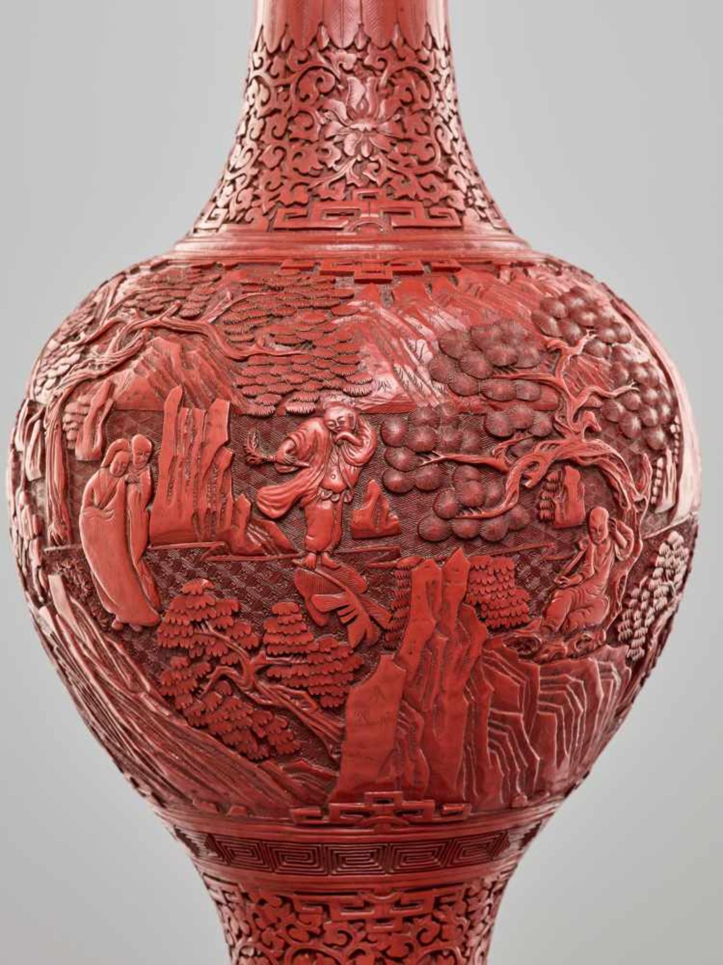 A LARGE PAIR OF CINNABAR LACQUER ‘EIGHT IMMORTALS’ VASES, QING DYNASTYThe body entirely covered with - Image 9 of 26