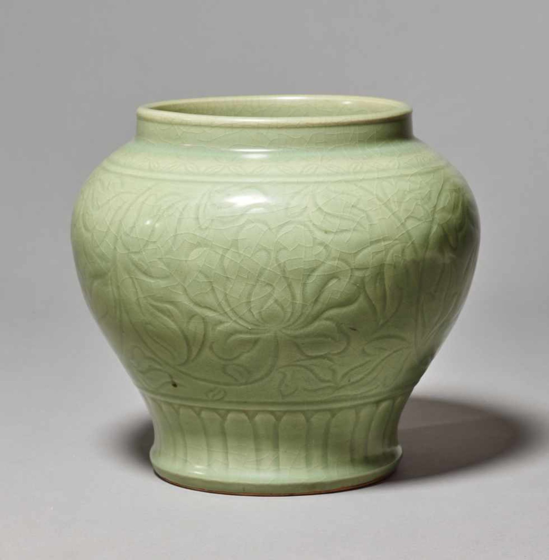 A LONGQUAN CARVED BALUSTER ‘LOTUS’ JAR, MING DYNASTYThe large and massively potted jar entirely - Image 3 of 7