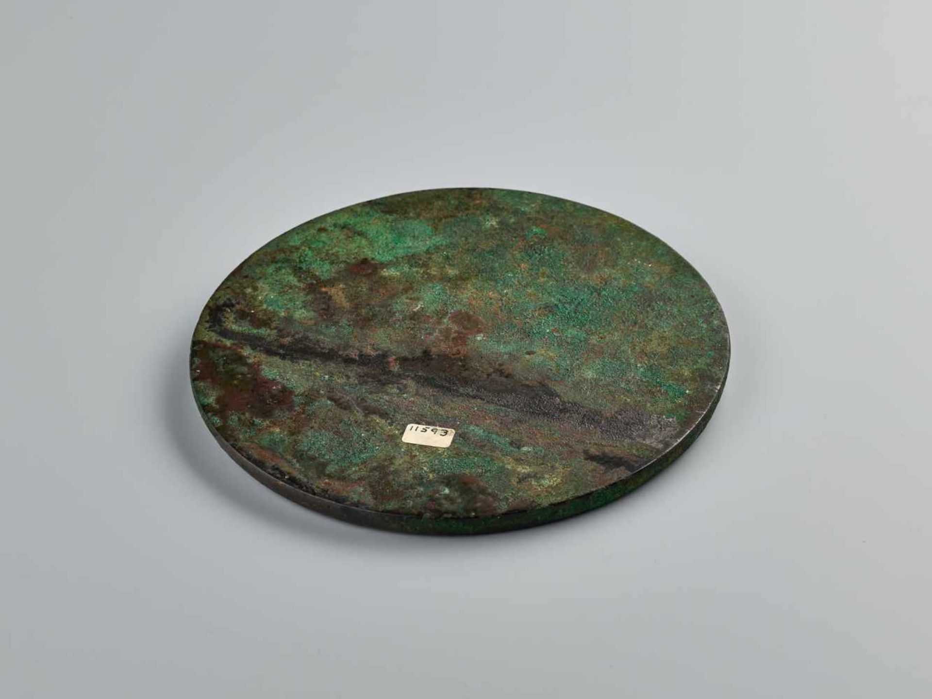 A LARGE INSCRIBED 'TLV' BRONZE MIRROR, HAN DYNASTYCast bronze with high relief, the patina with - Image 5 of 6