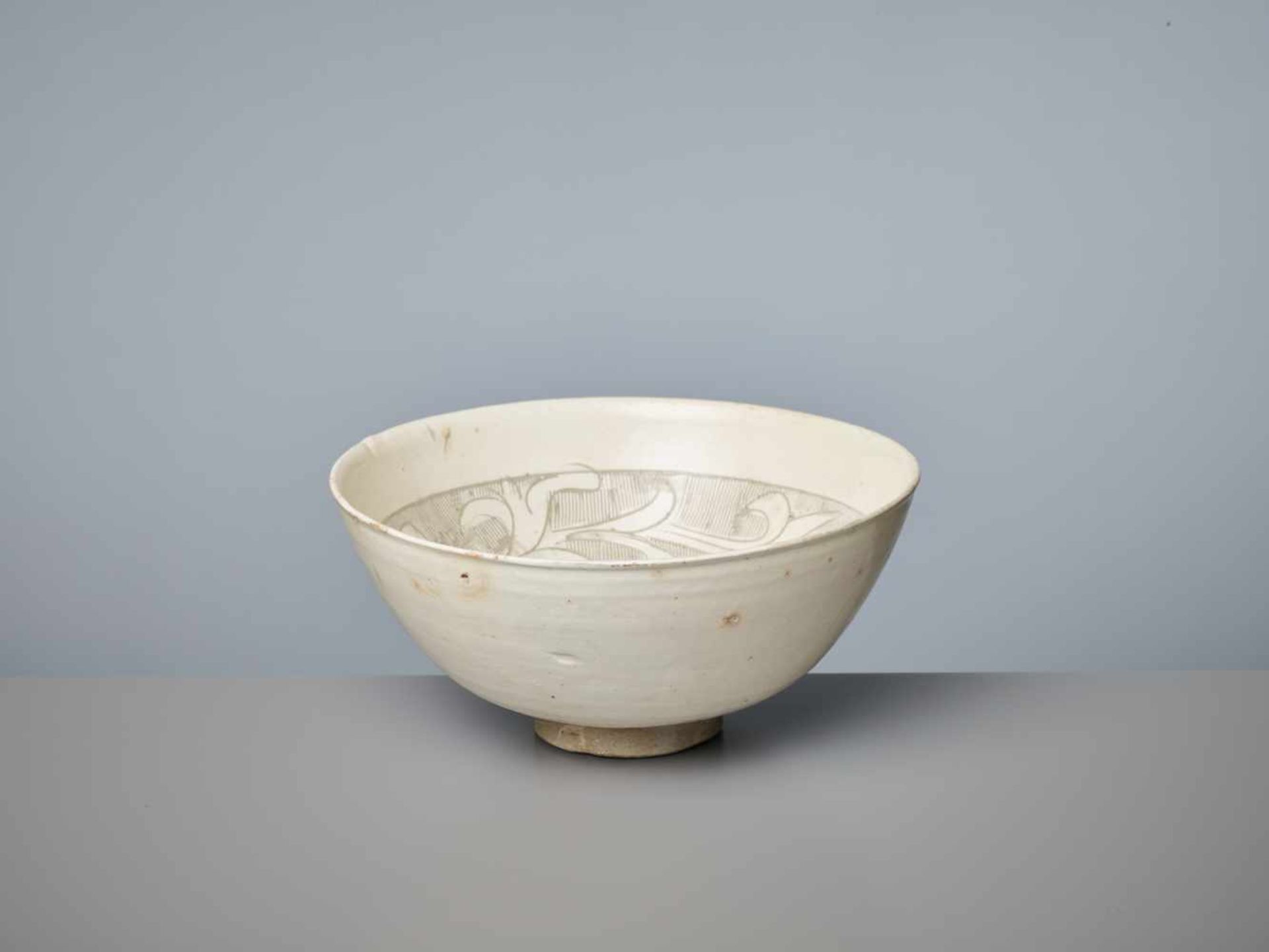 A CIZHOU ‘LOTUS AND CHRYSANTHEMUM’ SGRAFFIATO BOWL, 13TH – 14TH CENTURY PUBLISHED: Song Ceramics, - Image 3 of 8