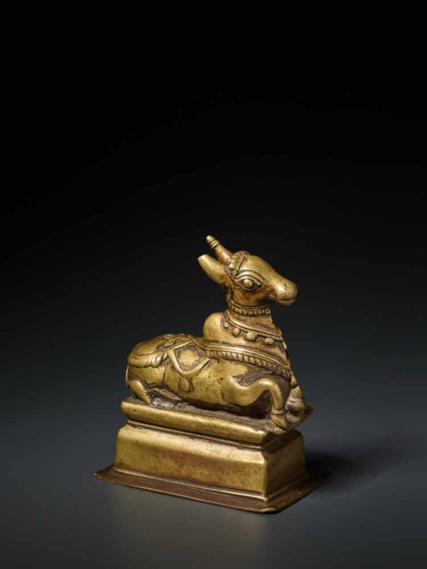 AN INDIAN BRASS FIGURE OF NANDI, 15th CENTURY Brass India, Himachal Pradesh, 15th century Nandi is - Image 5 of 7