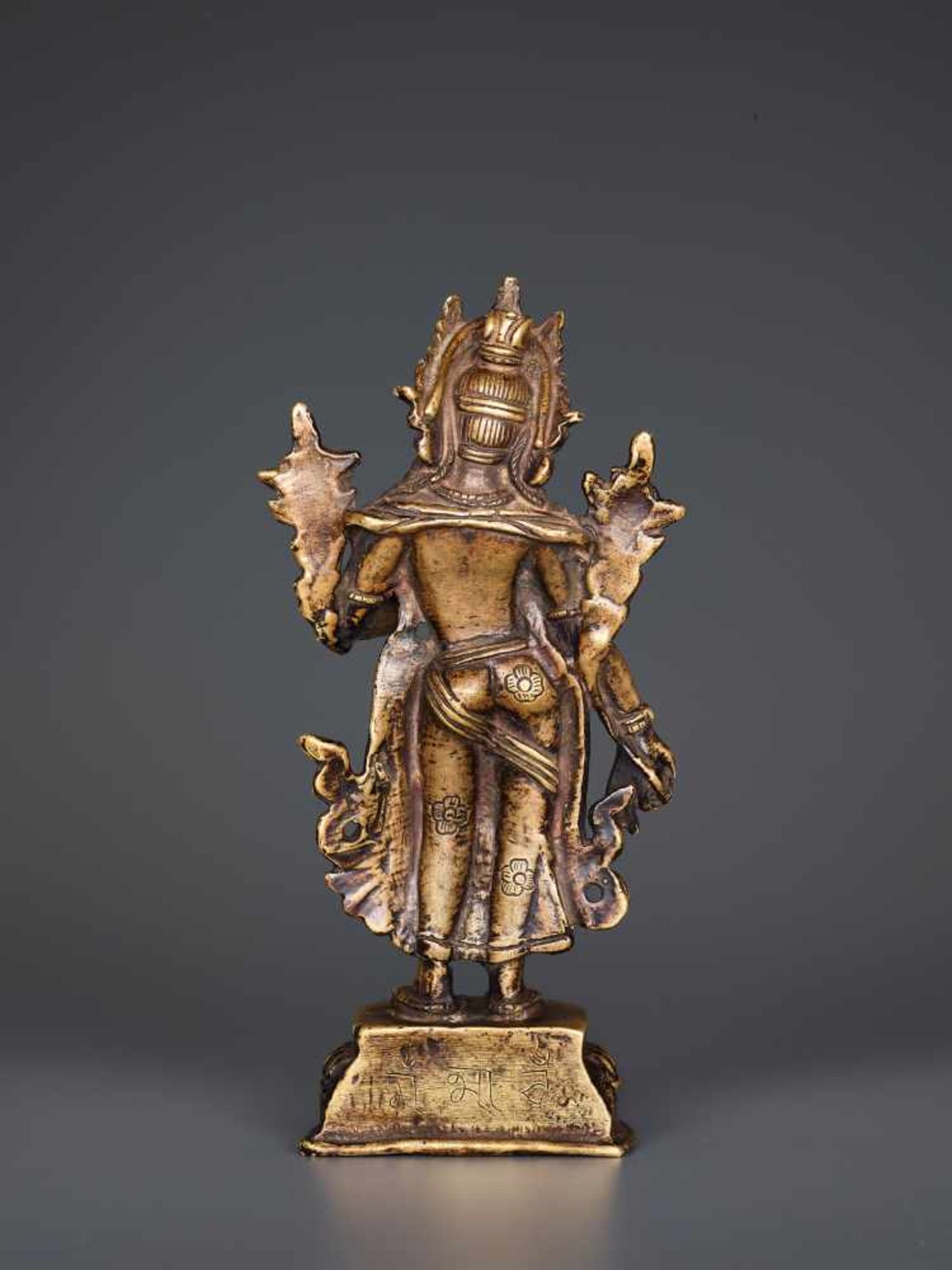 A BRONZE FIGURE OF TARA STANDING IN TRIBHANGA, TIBET, 19th CENTURY Cast and chased bronze, sealed - Image 5 of 7