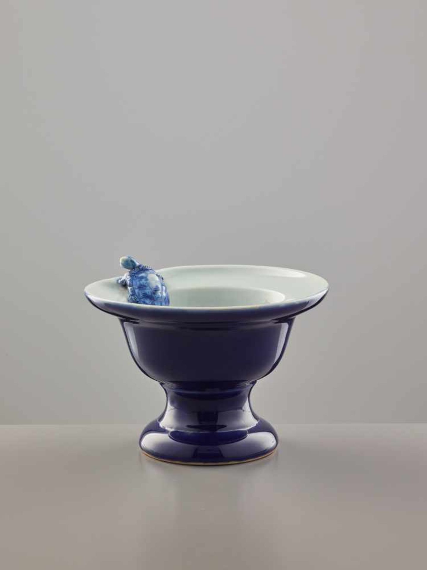 AN AMUSING HIRADO STYLE BLUE AND WHITE PORCELAIN VESSEL WITH AN ESCAPING TORTOISEPorcelainJapan,