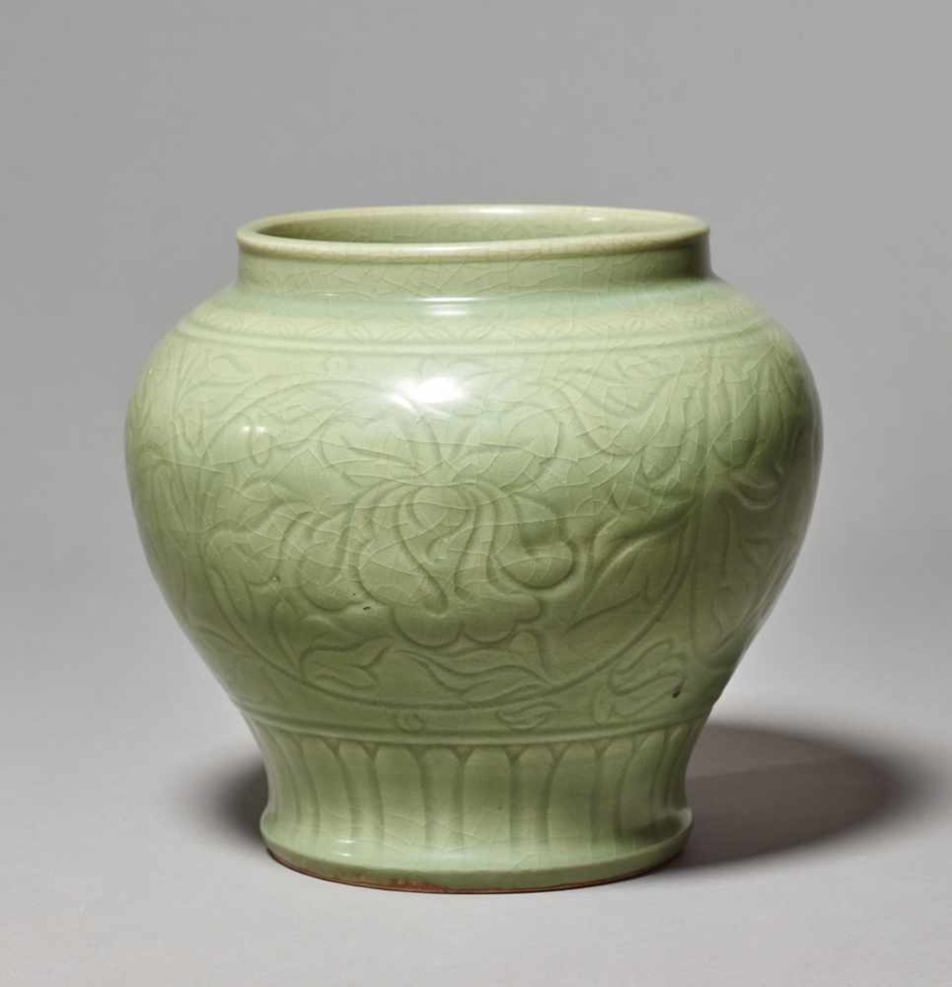 A LONGQUAN CARVED BALUSTER ‘LOTUS’ JAR, MING DYNASTYThe large and massively potted jar entirely - Image 2 of 7