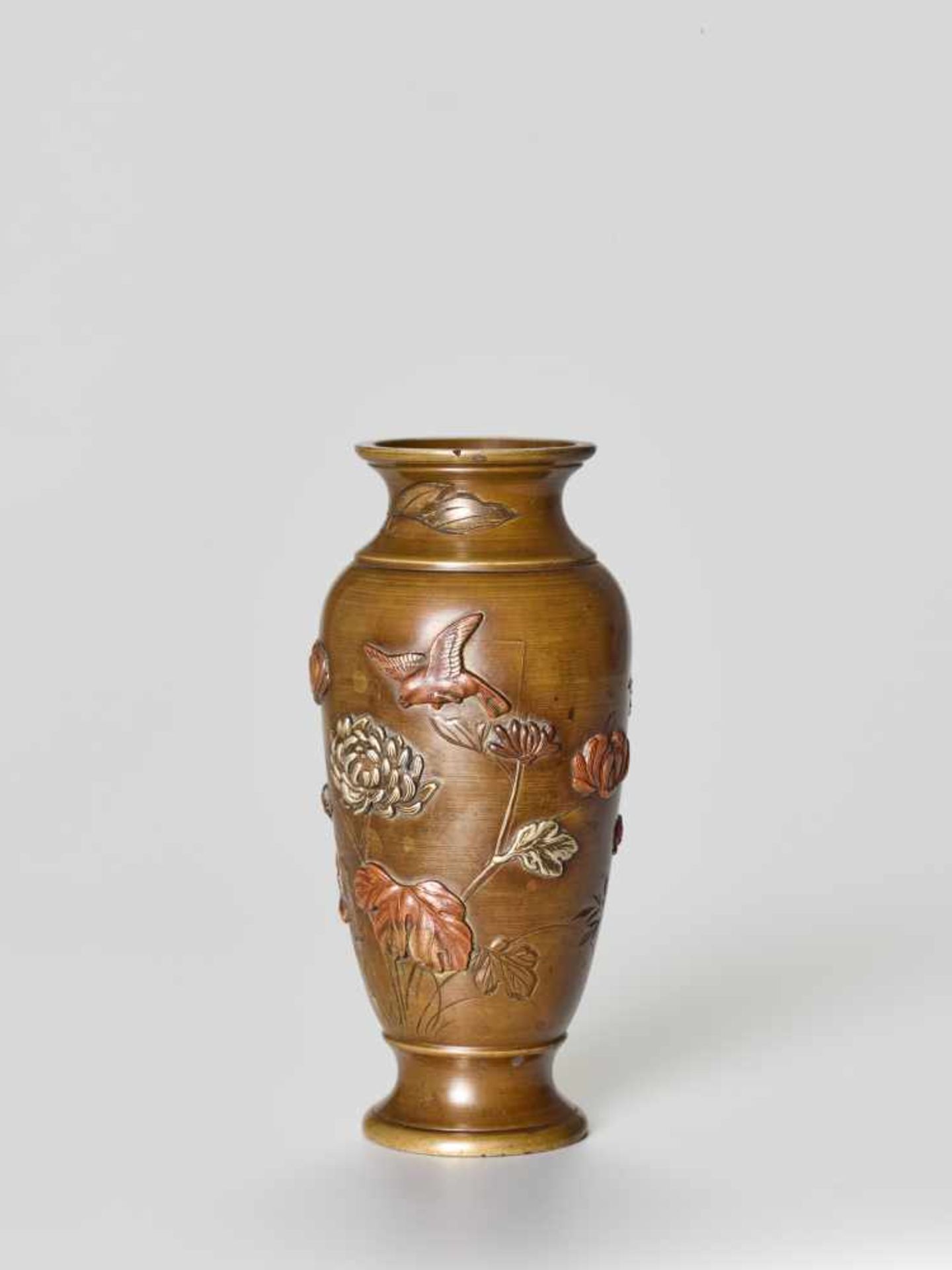 A SMALL MIXED METAL VASE WITH BIRDS AND FLOWERSSentoku with shibuichi and silver inlayJapan, late