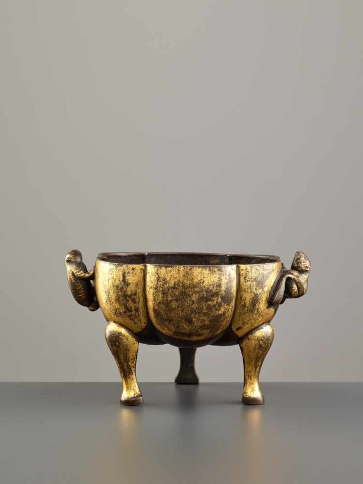 A PARCEL GILT TRIPOD CENSER WITH MONGOOSES, MING DYNASTY Parcel gilt copper bronze alloy, cast and - Image 3 of 9