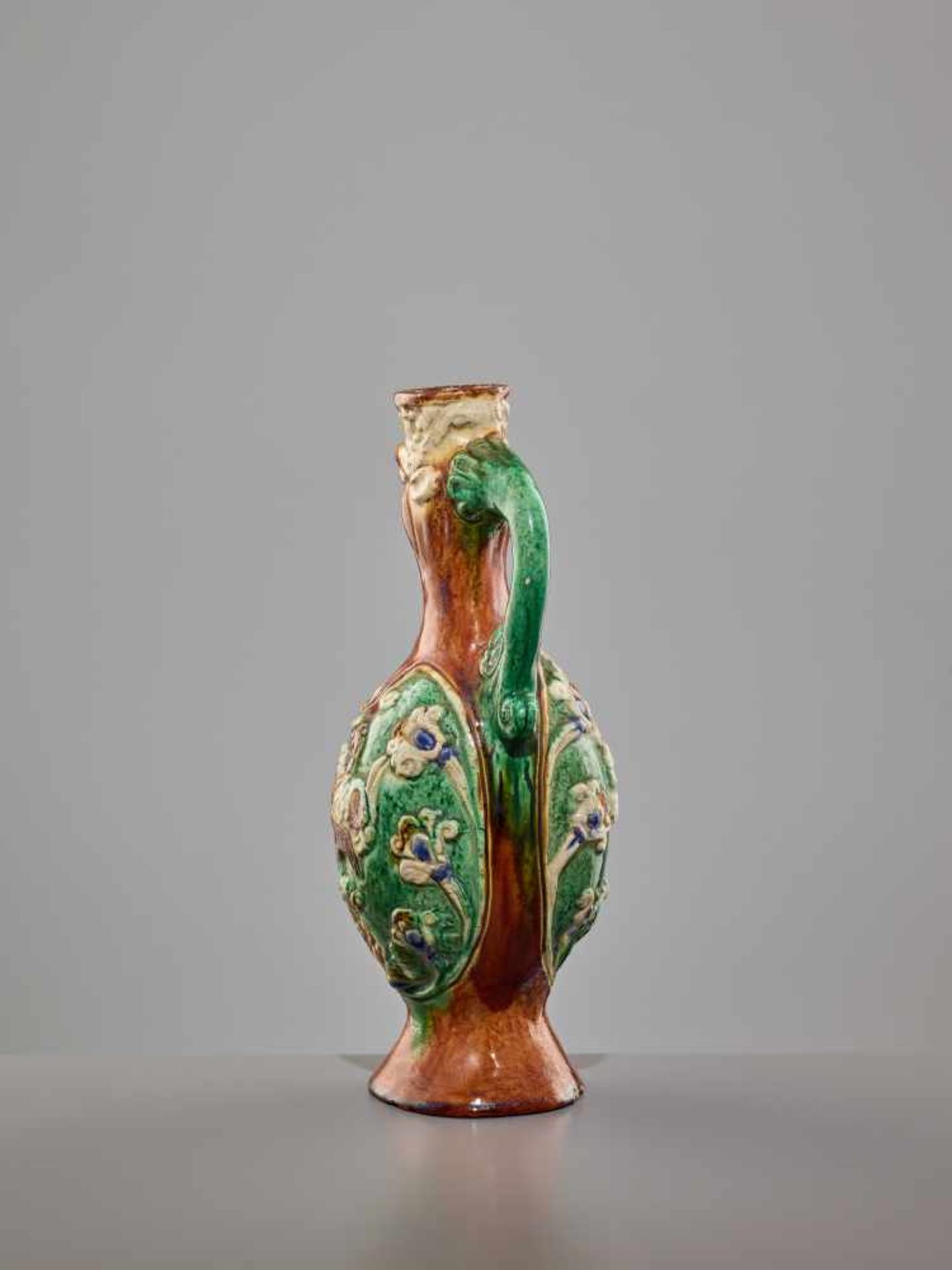 A RARE SANCAI-GLAZED 'PHOENIX' EWER, SONG DYNASTY The finely potted body of elegant ovoid form, - Image 3 of 10