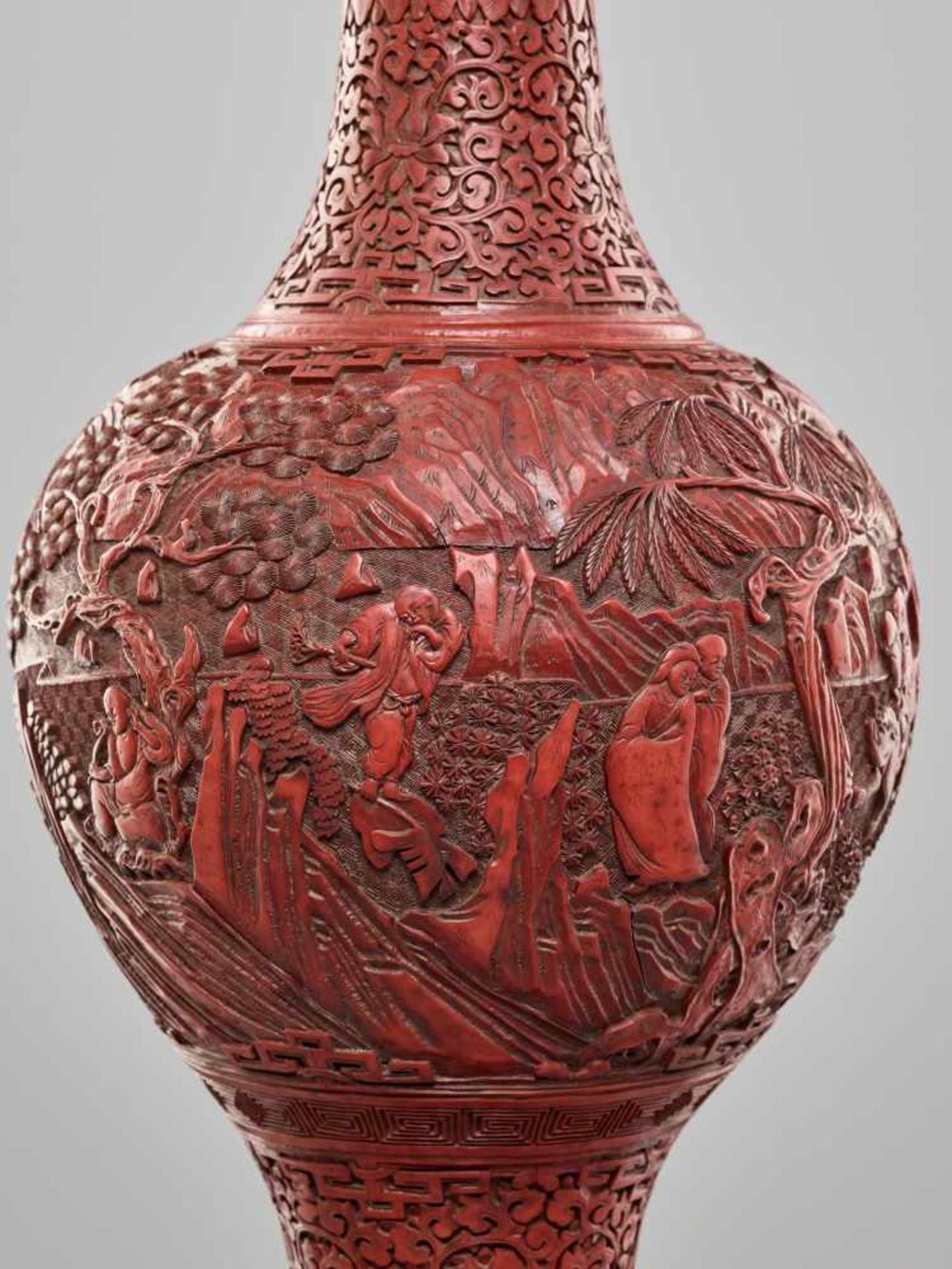 A LARGE PAIR OF CINNABAR LACQUER ‘EIGHT IMMORTALS’ VASES, QING DYNASTYThe body entirely covered with - Image 16 of 26