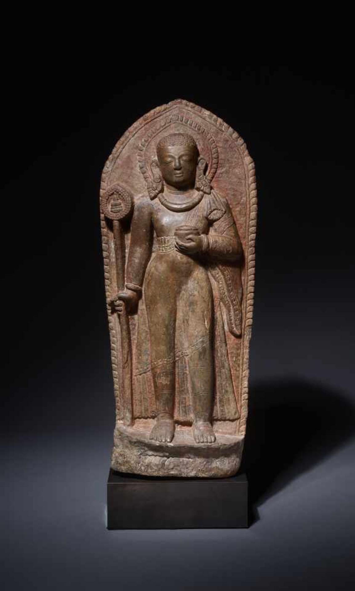 A LARGE AND IMPORTANT LIMESTONE STELE OF A DEVI, NEPAL, 14th – 15th CENTURY Limestone, sculpted,