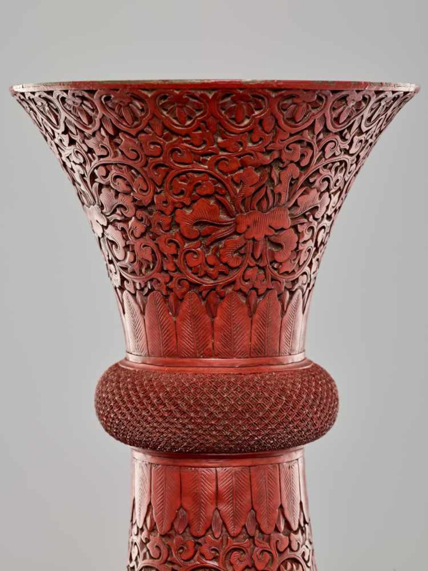 A LARGE PAIR OF CINNABAR LACQUER ‘EIGHT IMMORTALS’ VASES, QING DYNASTYThe body entirely covered with - Image 19 of 26