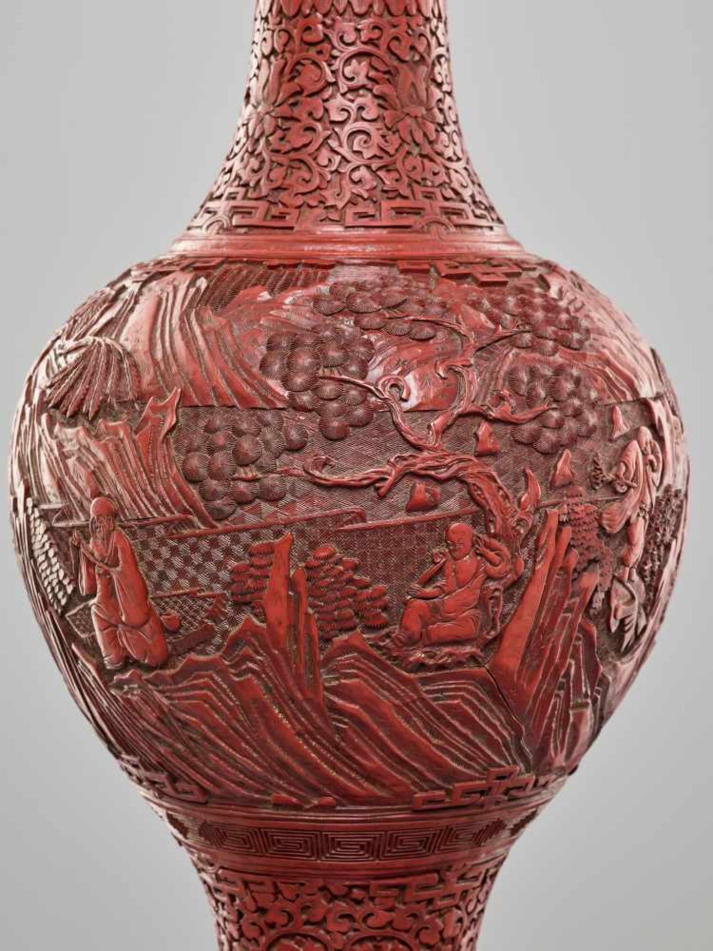 A LARGE PAIR OF CINNABAR LACQUER ‘EIGHT IMMORTALS’ VASES, QING DYNASTYThe body entirely covered with - Image 15 of 26