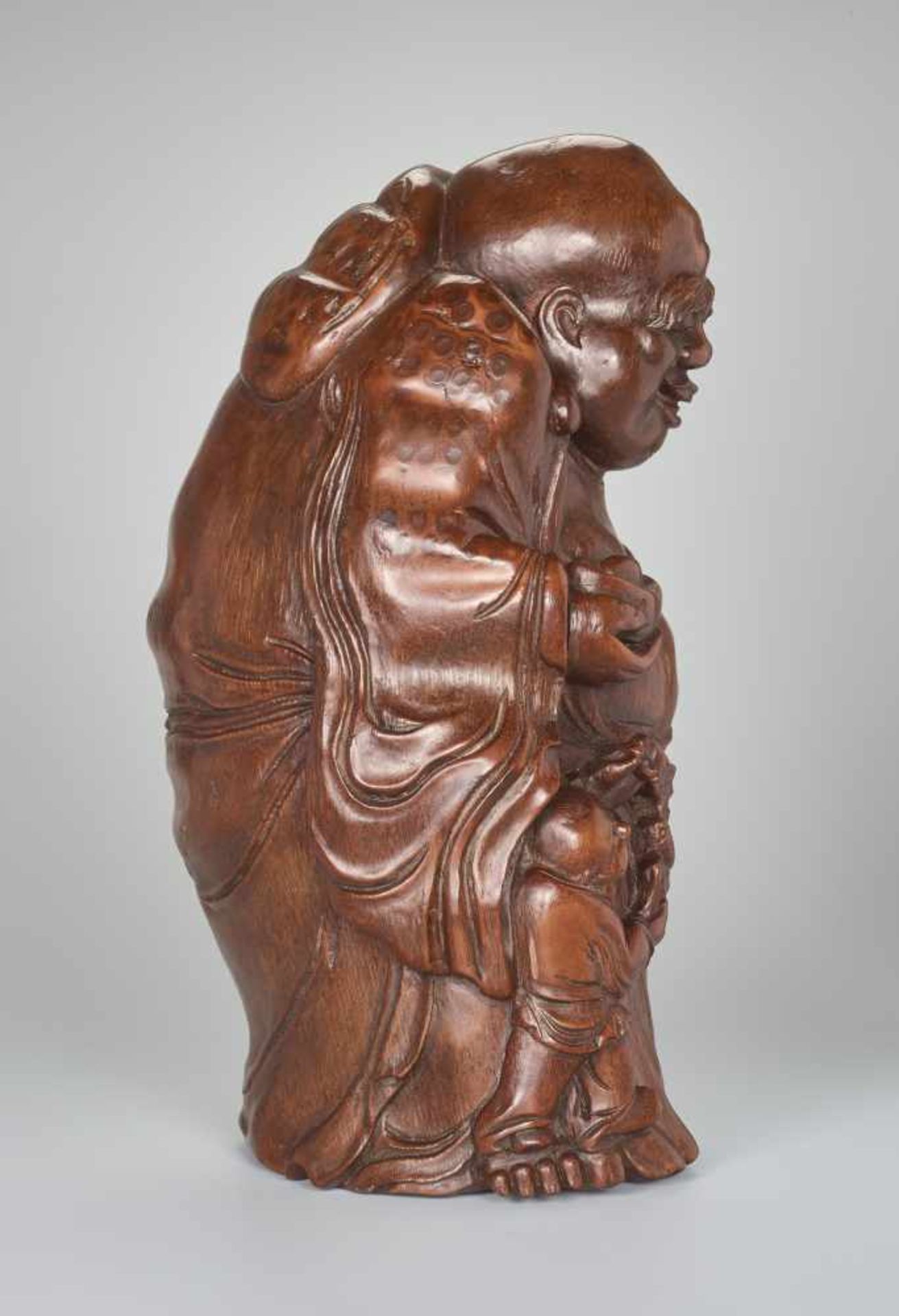 A VERY LARGE BAMBOO SHOOT CARVING OF BUDAI WITH INGOT, QING DYNASTYBamboo root China, Qing Dynasty - Image 6 of 9