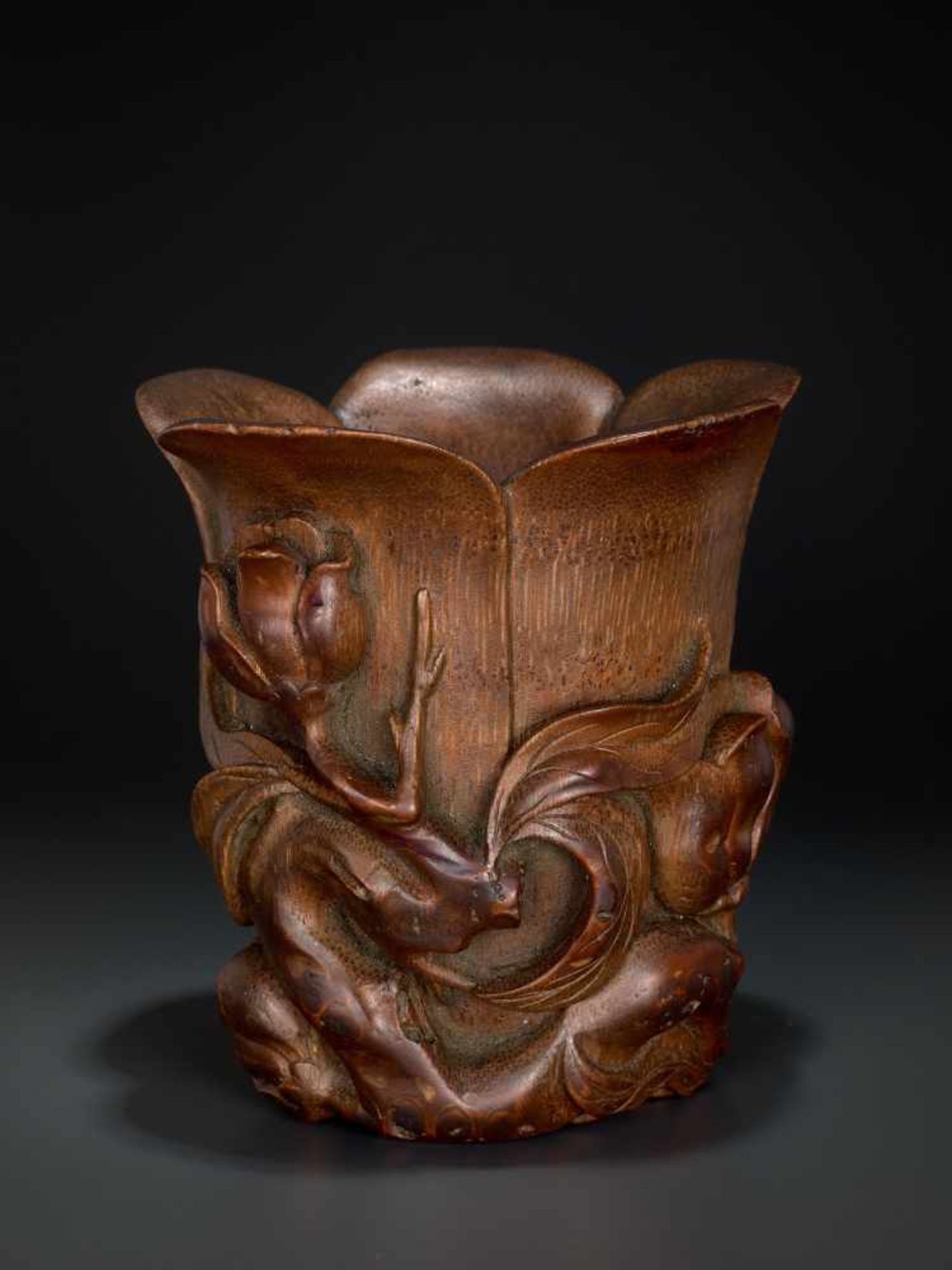 A CARVED KANGXI PERIOD BAMBOO ‘MAGNOLIA’ LIBATION CUP Bamboo, black lacquer China, Kangxi period ( - Image 3 of 7