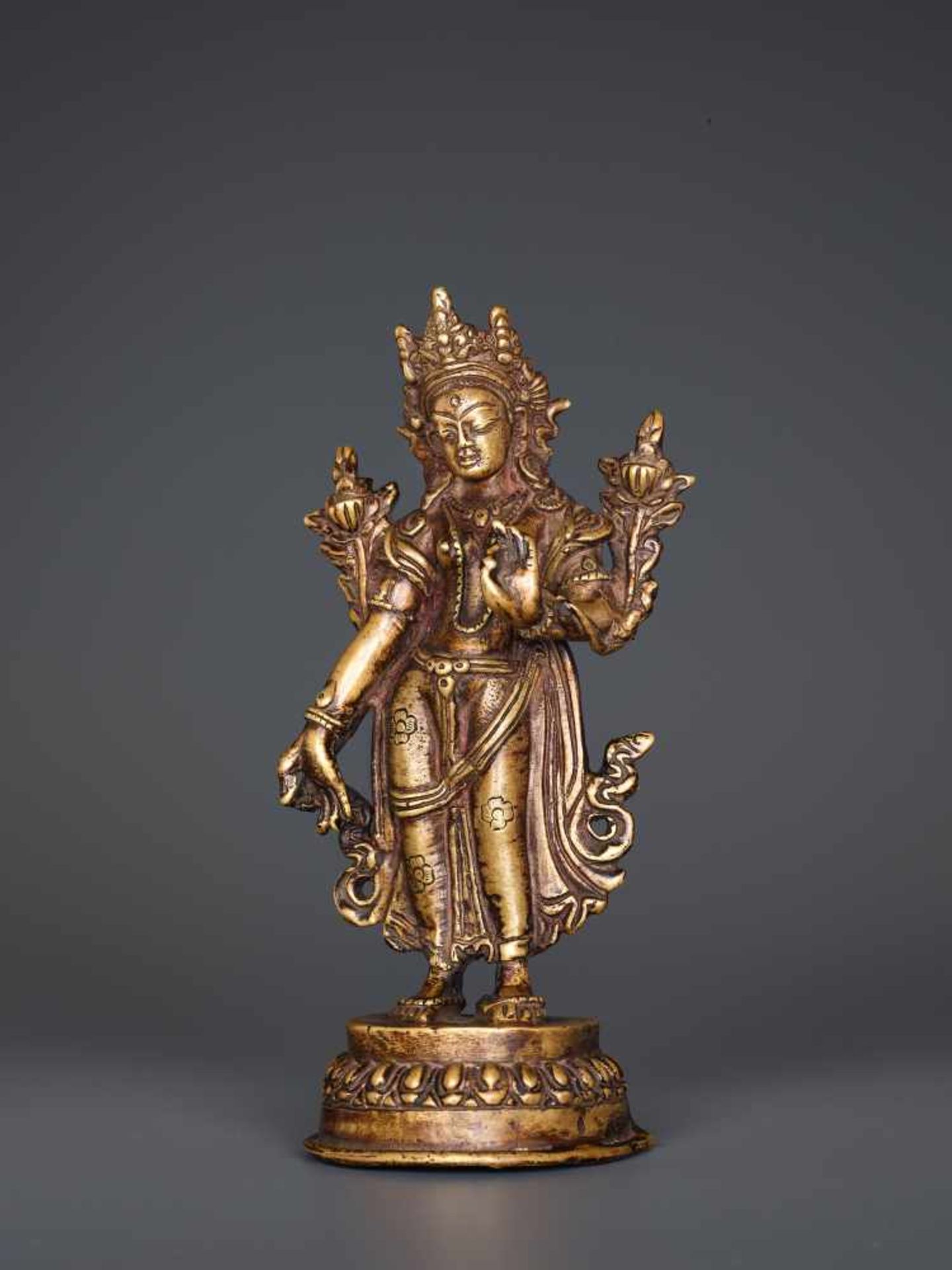 A BRONZE FIGURE OF TARA STANDING IN TRIBHANGA, TIBET, 19th CENTURY Cast and chased bronze, sealed - Image 2 of 7