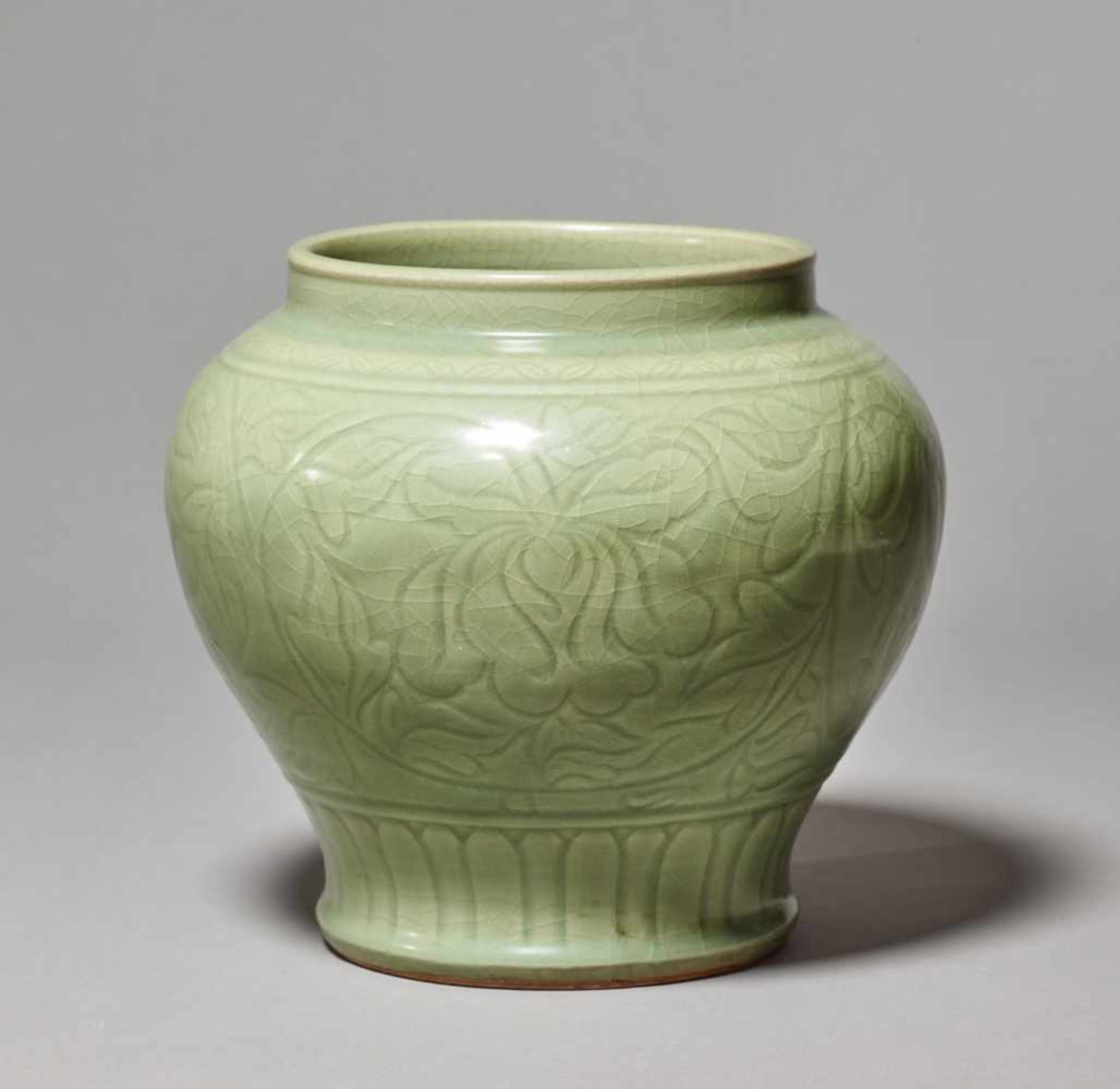 A LONGQUAN CARVED BALUSTER ‘LOTUS’ JAR, MING DYNASTYThe large and massively potted jar entirely - Image 4 of 7