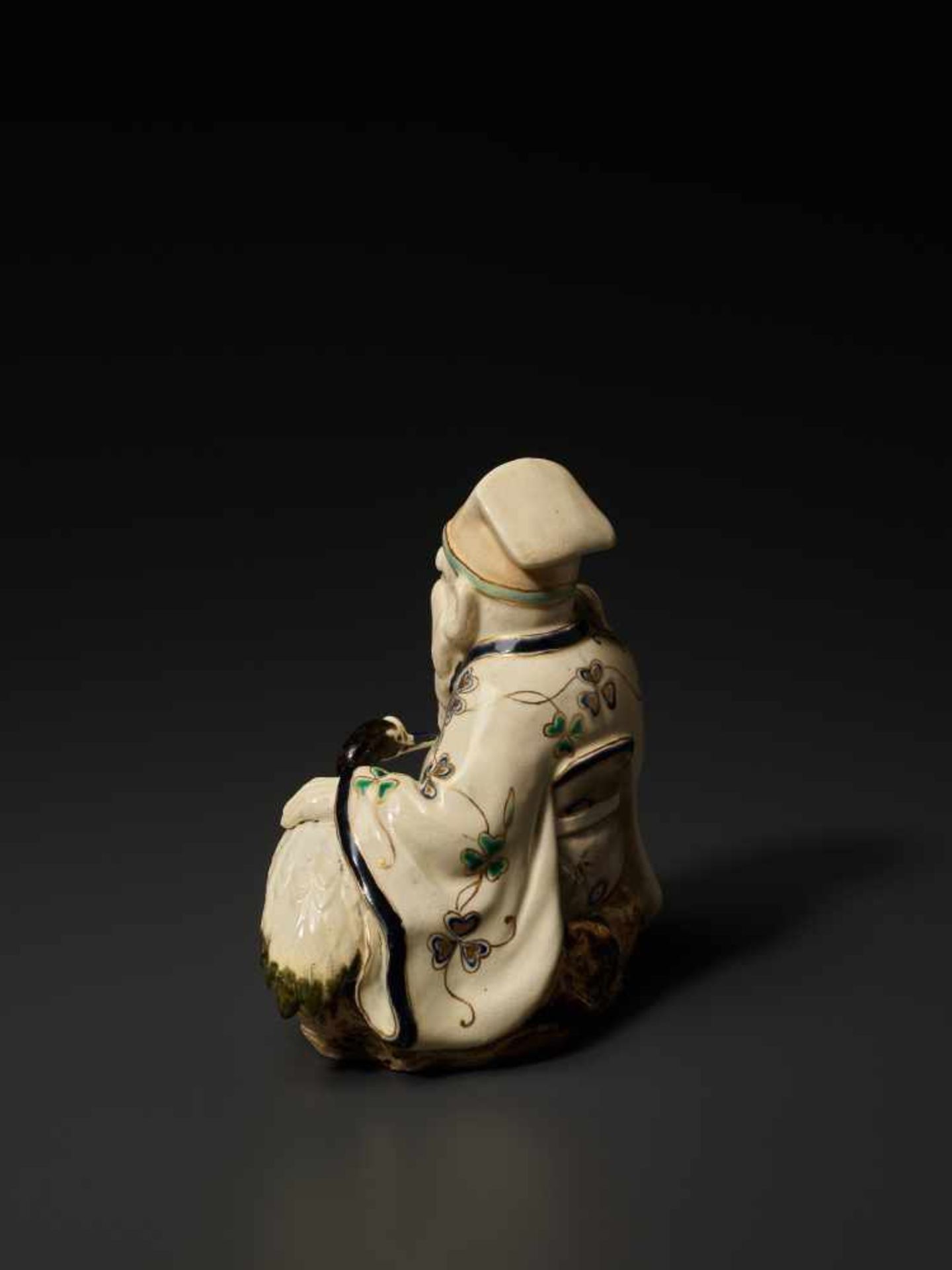 A SATSUMA OKIMONO FIGURE OF FUKUROKUJU WITH CRANESatsuma ceramicJapan, late 19th century, Meiji - Image 5 of 10