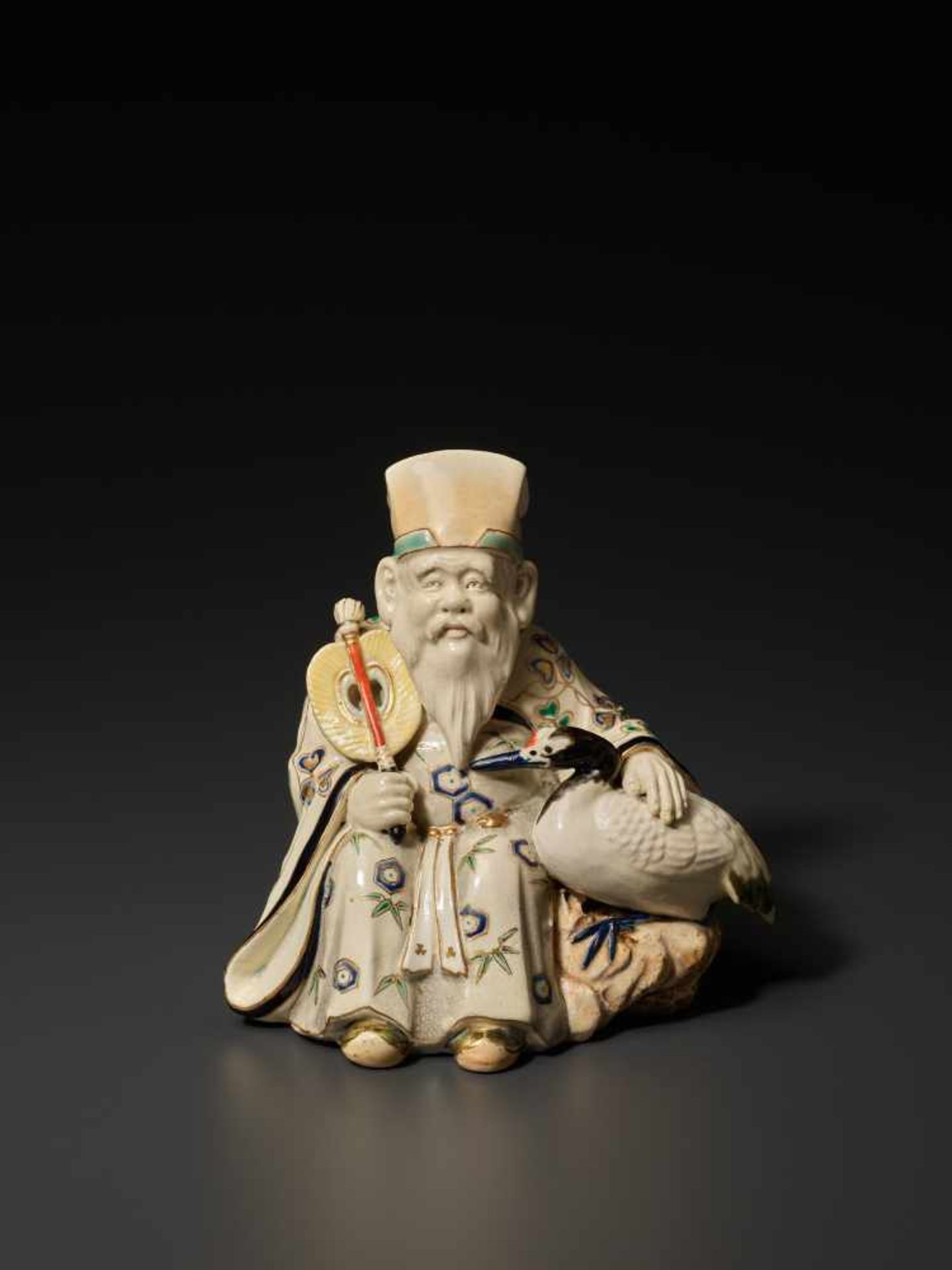 A SATSUMA OKIMONO FIGURE OF FUKUROKUJU WITH CRANESatsuma ceramicJapan, late 19th century, Meiji - Image 2 of 10