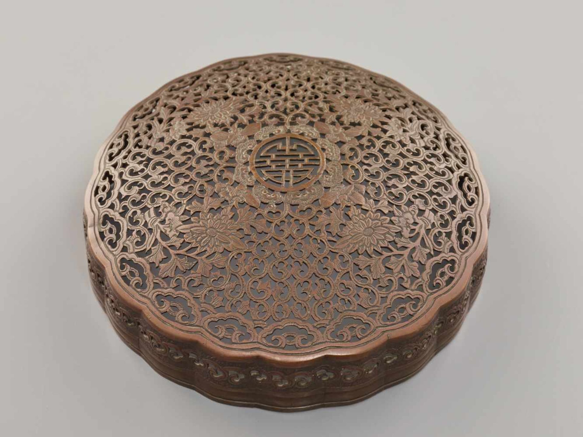 A COPPER HAND-WARMER WITH RETICULATED COVER, QING DYNASTYThe metal with an even reddish-brown - Image 12 of 15