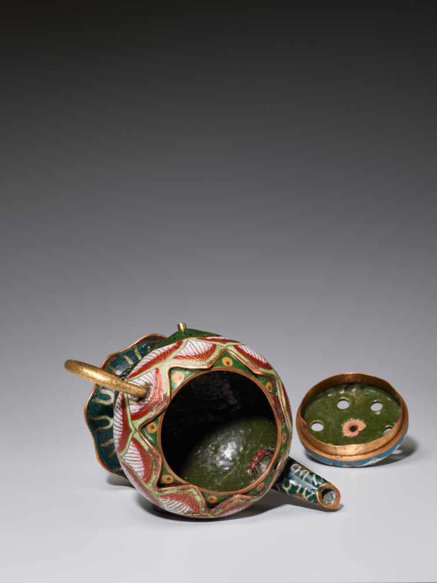 A EXTREMELY RARE CLOISONNE ENAMEL LOTUS-LEAF FORM EWER, 18TH CENTURYFire gilt and incised bronze, - Image 7 of 11