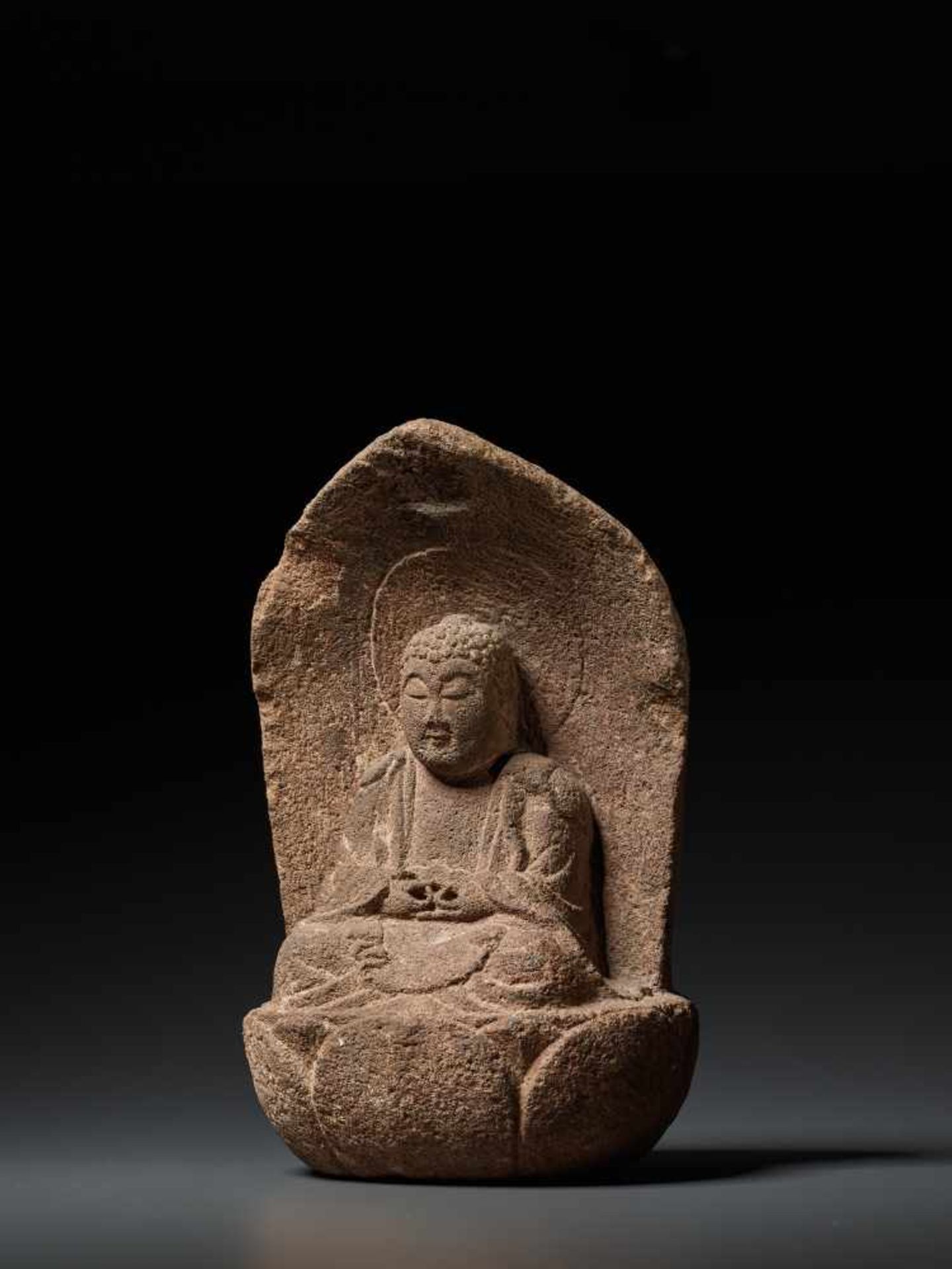 A MUROMACHI PERIOD STONE FIGURE OF BUDDHA AMIDA NYORAI Reddish-grey Sandstone, sculpted Japan, - Image 3 of 7